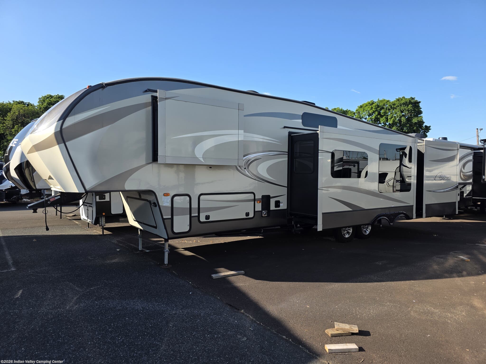 2017 Keystone Cougar 330RBK - Used Fifth Wheel For Sale by Indian Valley Camping Center in Souderton, Pennsylvania features Skylight, TV, Spare Tire Kit, Microwave, DVD Player