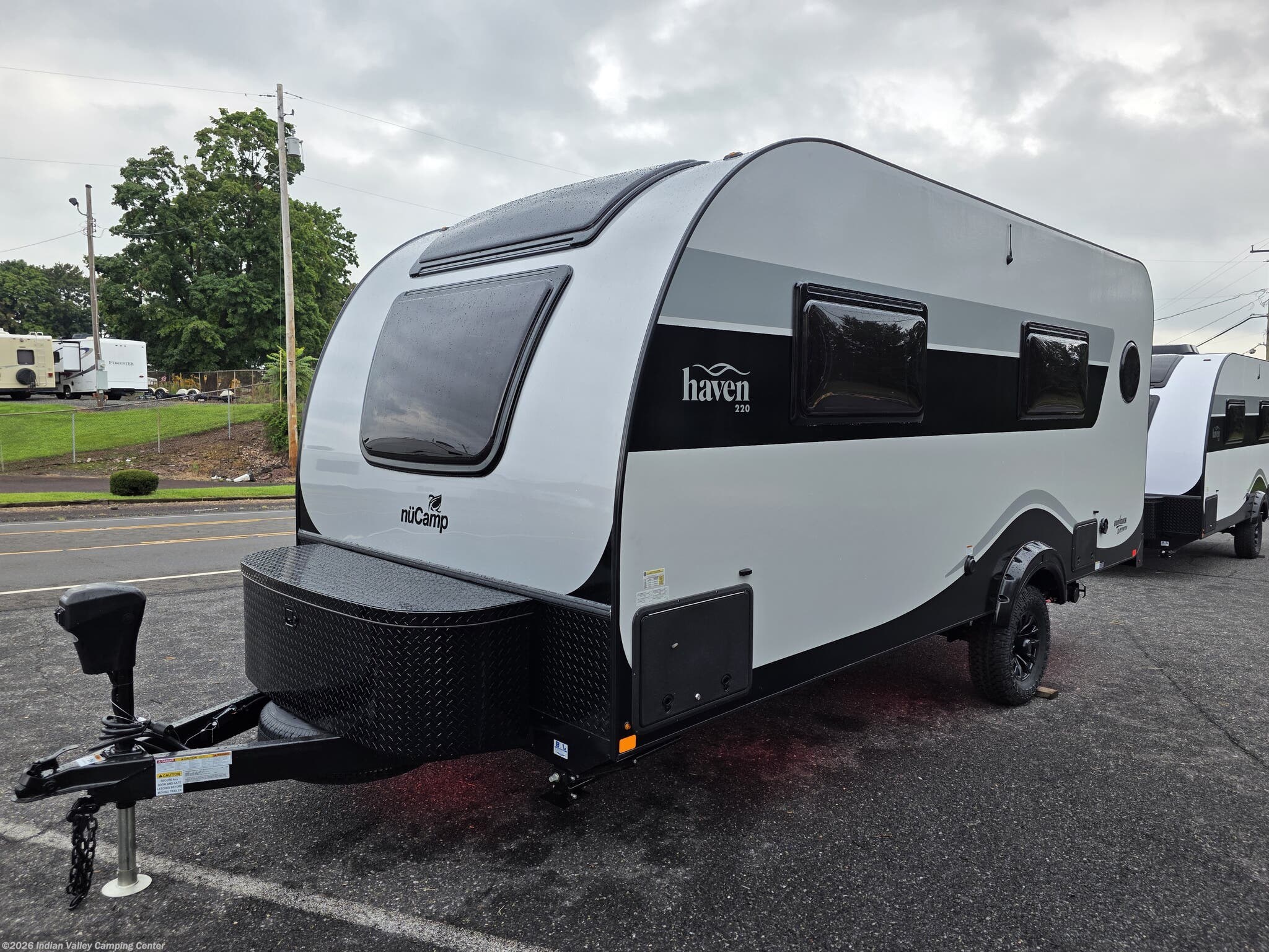 2027 NuCamp Haven Black Canyon Twin - New Travel Trailer For Sale by Indian Valley Camping Center in Souderton, Pennsylvania features External Shower, Air Conditioning, Refrigerator, Furnace, Stove Top Burner