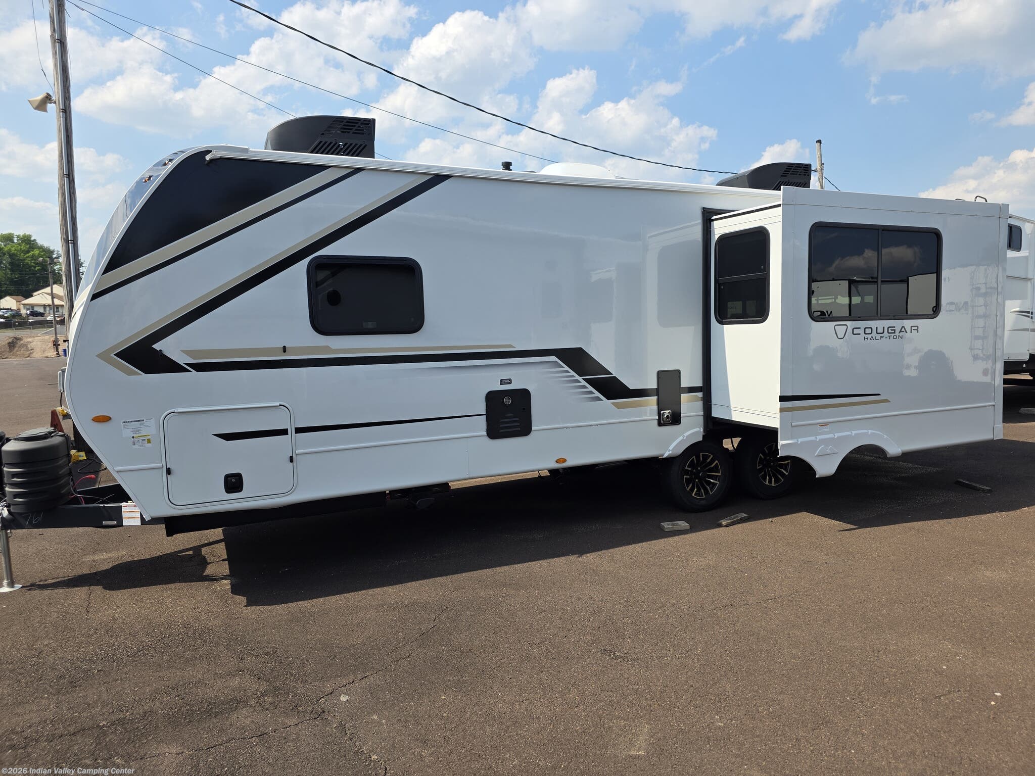 2026 Keystone Cougar Half-Ton 25MLE - New Travel Trailer For Sale by Indian Valley Camping Center in Souderton, Pennsylvania features Converter, Electric Heat, Air Conditioning, Propane, Fire Extinguisher