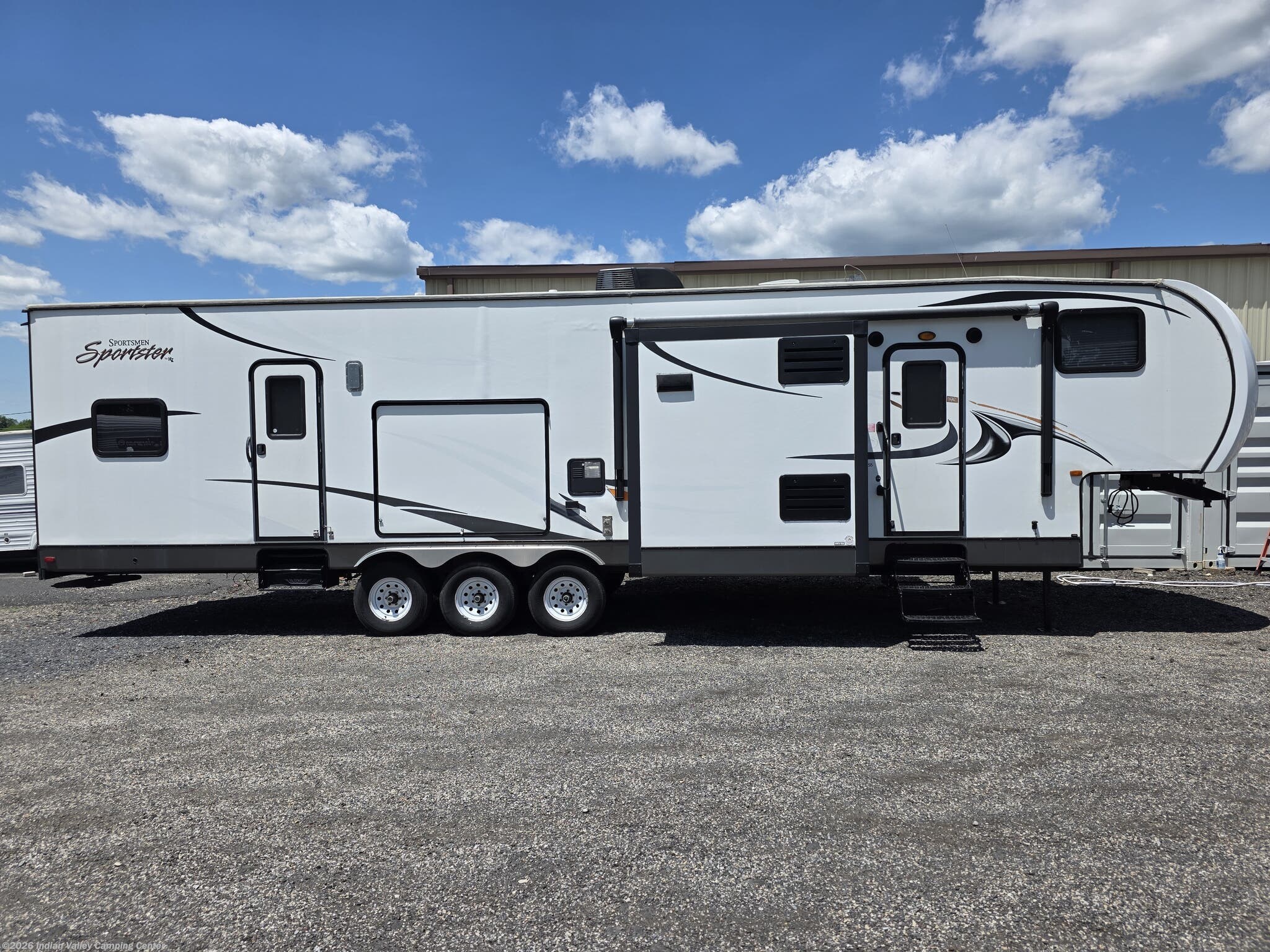 2015 K-Z Sportsmen Sportster 355TH12 - Used Toy Hauler For Sale by Indian Valley Camping Center in Souderton, Pennsylvania features Mini Blinds, Awning, AM/FM/CD, Medicine Cabinet, TV