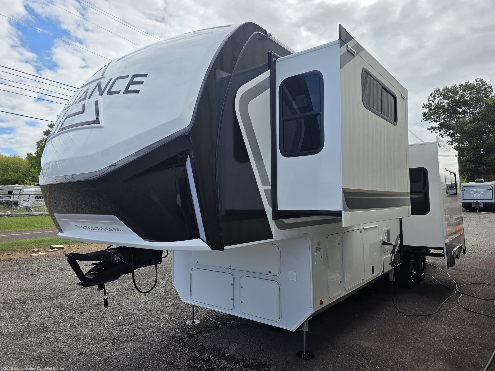 2027 Alliance RV Paradigm 312RK - New Fifth Wheel For Sale by Indian Valley Camping Center in Souderton, Pennsylvania features Slam Latch Baggage Doors, Residential Refrigerator, Detachable Power Cord, Toilet, Awning