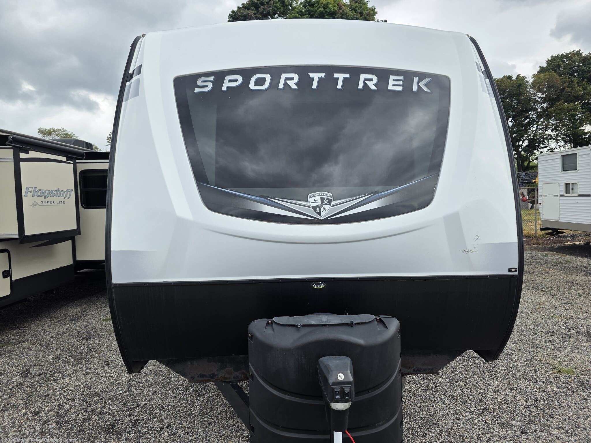 2021 Venture RV SportTrek Touring Edition STT343VIK - Used Travel Trailer For Sale by Indian Valley Camping Center in Souderton, Pennsylvania features Detachable Power Cord, Ladder, Microwave, Theater Seating, Toilet