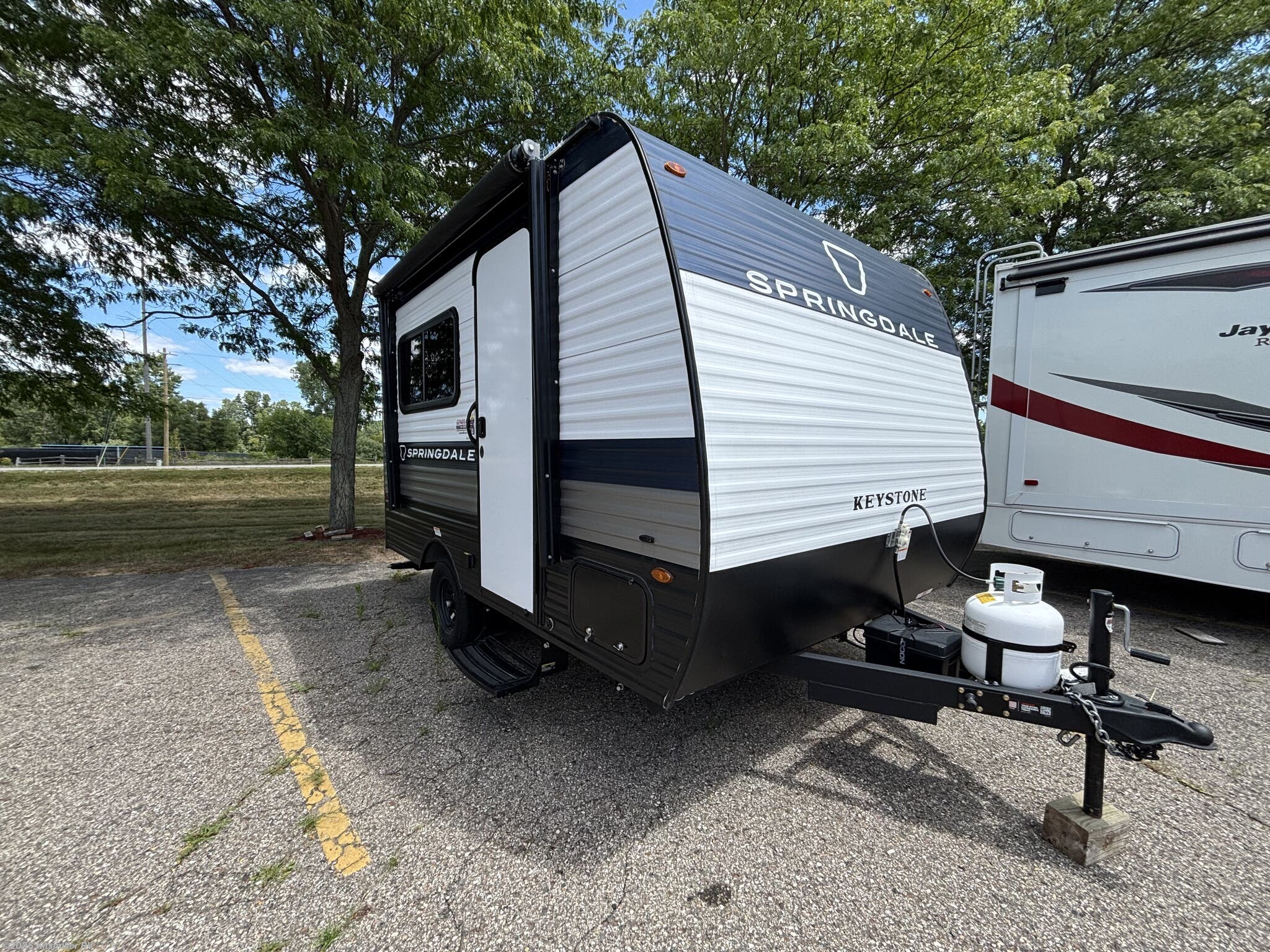 2026 Keystone Springdale 1320RD - Used Travel Trailer For Sale by Kitsmiller RV in Mason, Michigan features Air Conditioning, Kitchen Sink, Shower, Booth Dinette, LP Detector
