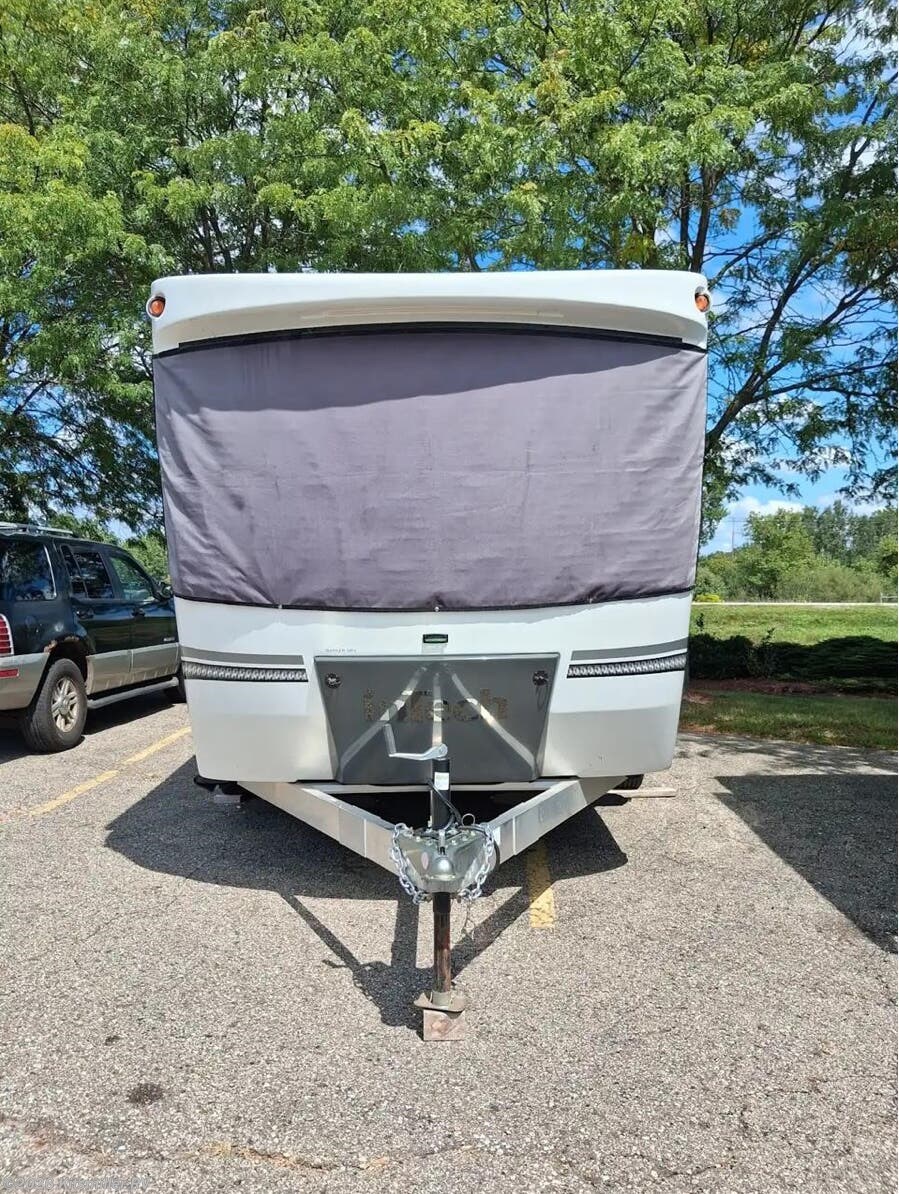 2022 inTech Sol Eclipse - Used Travel Trailer For Sale by Kitsmiller RV in Mason, Michigan features Enclosed Underbelly, Stabilizer Jacks, Tinted Windows, Power Awning, Dinette