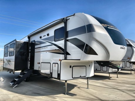 &lt;p class=&quot;MsoNormal&quot;&gt;The K-Z Sportsmen 303RL is a fifth wheel that is bursting with great amenities that are sure to excite those looking for a quality fifth wheel at a great price! Walk around this awesome RV and you will see lots of awesome features like the outside speakers and the power awning with LED light strip!&lt;/p&gt;
&lt;p class=&quot;MsoNormal&quot;&gt;It only gets better inside! You will want to sink in to the plush sofa and theater seating and chat while you take in the Walnut d&amp;eacute;cor, the LED lighting and spacious floorplan! From this spot, you can also check out the stunning LED HDTV and watch some of your favorite movies! The TV is surrounded by storage cabinets and has an electric fireplace below.&lt;/p&gt;
&lt;p class=&quot;MsoNormal&quot;&gt;Right next to the TV is the spacious island style kitchen that comes with plenty of room to pile around friends and family and chow down at dinner! Speaking of dinner, this kitchen really steps it up with dazzling cabinetry and all the must have items to get you fired up about cooking while on the road! You will find a large double bowl sink, a 3-burner stove top with a glass flip up cover, an oven, a microwave, and a refrigerator! The pantry and island shelves provide extra space for all your kitchen essentials.&lt;/p&gt;
&lt;p class=&quot;MsoNormal&quot;&gt;The bathroom is located right up the stairs and makes a great spot to freshen up with a foot flush toilet, a sink, a medicine cabinet, a shower with glass shower doors and a linen closet built in to the wardrobe slide. Wow!&lt;/p&gt;
&lt;p class=&quot;MsoNormal&quot;&gt;In the bedroom is a queen-sized bed that is surrounded by storage! There is a dresser built in to the slide and lots of overhead cabinetry! The bed lifts to reveal an extra-large storage area. And if that was not enough the dresser across from the bed provides extra storage as well.&lt;/p&gt;
&lt;p class=&quot;MsoNormal&quot;&gt;If you still are not convinced by all of these awesome features, then call or stop by today to learn more about this beautiful K-Z Sportsmen fifth wheel!&lt;/p&gt;