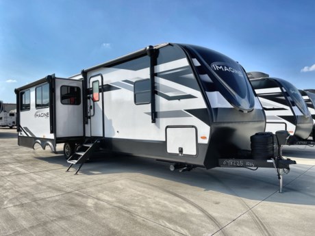 &lt;p class=&quot;MsoNormal&quot;&gt;Imagine yourself camping in this Grand Design Imagine travel trailer model 2970RL. This rear living model offers sleeping for four, a convenient kitchen island, and so much more!&lt;/p&gt;
&lt;p class=&quot;MsoNormal&quot;&gt;Step inside and find a complete bath straight ahead. This is a convenient location from anywhere in the trailer as well as from outside.&amp;nbsp;&amp;nbsp;Inside the bath find a large shower with skylight, a sink, linen cabinet, and toilet.&lt;/p&gt;
&lt;p class=&quot;MsoNormal&quot;&gt;The master bedroom gives mom and dad a bit of privacy with a door to the left of the main entry also that closes it off from the rest of the living space.&amp;nbsp;&amp;nbsp;Inside enjoy a comfortable queen size bed, dual bedside wardrobes, and overhead storage. To the left of the main entry door, you will find a slide out free-standing dinette along with theater seating for two including cup holders. There is more seating and sleeping space available with the rear tri-fold sofa including overhead cabinets for storage, plus end tables as well.&amp;nbsp;&amp;nbsp;Adjacent is a second living area slide out that features an entertainment center with a 40&quot; LED TV, a cozy fireplace, plus the kitchen appliances. The TV is easily viewable from any seating in the space.&lt;/p&gt;
&lt;p class=&quot;MsoNormal&quot;&gt;Cooking will be a breeze, as this unit provides a refrigerator that features pet dishes beneath that pull out when in use. There is also a three-burner range with overhead microwave oven, and a pantry for food storage also. There is a nice hutch along the interior wall for storing dishes and things, plus a convenient kitchen island including a large single sink, and so much more!&lt;/p&gt;
&lt;p class=&quot;MsoNormal&quot;&gt;You will also enjoy the amount of space for outdoor storage in the exterior drop-frame pass-through compartment up front for all your outdoor camping gear.&lt;/p&gt;
&lt;p&gt;&amp;nbsp;&lt;/p&gt;
&lt;p class=&quot;MsoNormal&quot;&gt;Come out today and look at this Grand Design Imagine 2970RL!&lt;/p&gt;