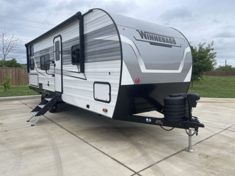 &lt;p&gt;Winnebago Industries Towables Access travel trailer 26BH highlights:&lt;/p&gt;
&lt;ul&gt;
&lt;li&gt;Set of 32&quot; x 74&quot; Bunks&lt;/li&gt;
&lt;li&gt;Jack Knife Sofa&lt;/li&gt;
&lt;li&gt;Private Front Bedroom&lt;/li&gt;
&lt;li&gt;Pass-Through Storage&lt;/li&gt;
&lt;li&gt;Exterior Kitchen&lt;/li&gt;
&lt;/ul&gt;
&lt;p&gt;&amp;nbsp;&lt;/p&gt;
&lt;p&gt;Your&amp;nbsp;family of eight&amp;nbsp;will enjoy camping in this Access camper.&amp;nbsp; You will have the choice of cooking both inside and out with the accessible outdoor kitchen featuring a&amp;nbsp;pull-out griddle, 1.6 cu. ft. refrigerator and handy pull-out 11.75&quot; x 20&quot; drawer for cooking utensils, hot pads, etc. On the inside, a three burner cooktop makes whipping up family meals a breeze and there is a&amp;nbsp;10 cu. ft. refrigerator&amp;nbsp;as well.&amp;nbsp; For sleeping, your family will find comfort in a set of 32&quot; x 74&quot; bunks, a booth dinette that can also be transformed into sleeping for two at night, plus the jack knife sofa and private bedroom which features a queen bed up front.&amp;nbsp; Storage is abundant and can be found throughout in overhead cabinets, bedside wardrobes, and under the queen bed. On the exterior, you will also find a convenient&amp;nbsp;exterior pass through storage&amp;nbsp;compartment for lawn chairs, outdoor games, fishing poles, etc.&lt;/p&gt;
&lt;p&gt;&amp;nbsp;&lt;/p&gt;
&lt;p&gt;With any Winnebago Access travel trailer you will find thoughtful, clean, and contemporary designs filled with premium features that all have come to expect on any Winnebago towable. The powered stabilizer jacks make setting up camp easy with just the touch of a single button.&amp;nbsp; You will appreciate the stylish exterior front profile and thicker sidewall metal for greater aerodynamics plus strength and durability.&amp;nbsp; With a fully enclosed underbelly you can extend your camping season into the colder months, and the 12 volt tank pad heaters will keep you from having frozen pipes.&amp;nbsp; On the inside, a porcelain toilet, larger skylights for more natural lighting, abundant storage, and spacious living areas make every camping trip more enjoyable.&amp;nbsp; And, the 200 watt solar power reduces the need for shore power which makes it easy to go off-grid.&amp;nbsp; Make your choice today and Access your next adventure!&lt;/p&gt;
