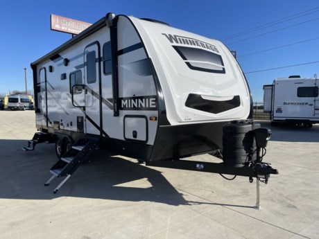 &lt;p&gt;The 2024 Winnebago Minnie 2326BH is a travel trailer that effortlessly combines style, comfort, and functionality to create an ideal home away from home. With its sleek and aerodynamic exterior design, this travel trailer is not only visually appealing but also enhances fuel efficiency during travel.&lt;/p&gt;
&lt;p&gt;Measuring at 26 feet 8 inches in length, the Minnie 2326BH is a compact yet spacious travel companion. The floor plan is thoughtfully designed to maximize living space, providing a comfortable and inviting interior. The interior decor features modern finishes, creating a warm and welcoming atmosphere for travelers.&lt;/p&gt;
&lt;p&gt;Accommodating a variety of travel preferences, the 2326BH boasts a versatile sleeping arrangement. The master bedroom includes a cozy queen-size bed, offering a restful retreat after a day of exploration. The bunkhouse area is perfect for families or groups, providing additional sleeping quarters with comfortable bunk beds.&lt;/p&gt;
&lt;p&gt;The well-appointed kitchen is equipped with high-quality appliances, including a refrigerator, stove, oven, and microwave. The ample counter space and storage cabinets ensure that preparing meals on the road is convenient and enjoyable. The dinette area is perfect for enjoying meals together, and it can also be converted into an additional sleeping space if needed.&lt;/p&gt;
&lt;p&gt;The Minnie 2326BH prioritizes comfort with its spacious bathroom, complete with a shower, toilet, and sink. The thoughtful layout ensures that every inch of space is utilized efficiently.&lt;/p&gt;
&lt;p&gt;This travel trailer is designed with outdoor enthusiasts in mind, featuring an exterior awning for shaded outdoor relaxation. The sturdy construction and quality materials ensure durability on the road, providing peace of mind for travelers.&lt;/p&gt;
&lt;p&gt;Whether embarking on a weekend getaway or an extended road trip, the 2024 Winnebago Minnie 2326BH offers a perfect blend of style, functionality, and comfort for a memorable travel experience.&lt;/p&gt;