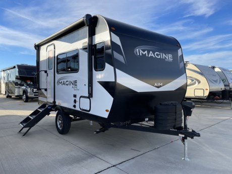 &lt;p&gt;Grand Design Imagine AIM 14MS travel trailer highlights:&lt;/p&gt;
&lt;ul&gt;
&lt;li&gt;Murphy Bed Slide Out&lt;/li&gt;
&lt;li&gt;Kitchen Shelves&lt;/li&gt;
&lt;li&gt;12&#39; Power Awning with LED Lights&lt;/li&gt;
&lt;li&gt;Exterior Spray Port&lt;/li&gt;
&lt;li&gt;Sleeps Two&lt;/li&gt;
&lt;/ul&gt;
&lt;p&gt;&amp;nbsp;&lt;/p&gt;
&lt;p&gt;This simple, but cozy travel trailer is sure to meet all of your camping needs. There is a&amp;nbsp;full rear bath&amp;nbsp;with a shower skylight and wardrobe to keep your things tidy. The front kitchen includes ample counter space to prep meals and a&amp;nbsp;bar tabletop dinette&amp;nbsp;with three stools you are sure to love. A two burner cooktop also comes standard, along with a convection microwave, and an&amp;nbsp;exterior griddle&amp;nbsp;for when you want to cook outdoors under the 12&#39; awning! The versatile Murphy bed provides seating and sleeping space each day, and the hi-definition&amp;nbsp;LED TV&amp;nbsp;across from the bed will let you watch movies at night.&lt;/p&gt;
&lt;p&gt;&amp;nbsp;&lt;/p&gt;
&lt;p&gt;Aim for new destinations in one of these Grand Design Imagine AIM travel trailers! They are constructed to a superior standard with the 4-Seasons Protection Package that features a heated and enclosed underbelly with suspended tanks, a moisture barrier floor enclosure, a double insulated roof and front wall, and more. There is backup camera prep outside, along with a universal docking station, a power tongue jack, and durable Tuff-Ply pass-thru flooring for your camp gear. You are sure to feel at home with residential cabinetry, premium window treatments, residential countertops, and a spacious walk-in shower to name a few comforts. The on-demand tankless water heater is a feature you won&#39;t want to camp without and the hi-definition LED TV will ensure you&#39;ll never go bored on rainy days. Each model also comes with four AIM packages; the Peace of Mind Package, The Ultimate Power Package, The 4-Season Protection Package, and the Solar Package!&lt;/p&gt;