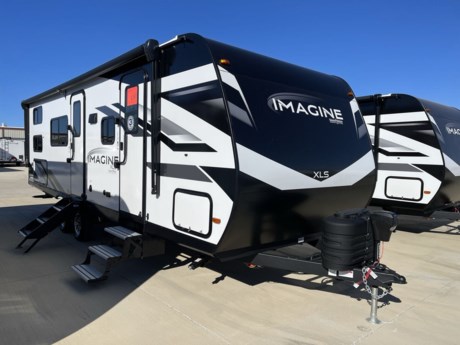 &lt;p&gt;Embrace Outdoor Living with the 2024 Grand Design Imagine XLS 25DBE Travel Trailer&lt;/p&gt;
&lt;p&gt;Are you seeking the perfect travel trailer for your outdoor adventures? Look no further than the 2024 Grand Design Imagine XLS 25DBE, a superbly designed trailer that combines comfort, style, and convenience for your camping experiences. Whether you&#39;re a seasoned camper or new to the world of travel trailers, the Imagine XLS 25DBE is built to provide you and your loved ones with an exceptional and memorable camping journey.&lt;/p&gt;
&lt;p&gt;Spacious and Inviting Interior:&amp;nbsp;Step inside, and you&#39;ll find a spacious and inviting interior that&#39;s perfect for relaxation and creating cherished memories. The living area features cozy seating, a convertible booth dinette, and large windows that let natural light fill the space, creating a warm and welcoming atmosphere for you and your fellow travelers.&lt;/p&gt;
&lt;p&gt;Efficient Kitchen and Bath:&amp;nbsp;The well-equipped kitchen boasts modern appliances, including a refrigerator, a stove, a microwave, and ample storage space for all your cooking essentials. Meal preparation becomes a breeze, allowing you to enjoy delicious meals even while on the road. The bathroom is designed for convenience, featuring a shower, a toilet, and a sink.&lt;/p&gt;
&lt;p&gt;Comfortable Sleeping Quarters:&amp;nbsp;The Imagine XLS 25DBE offers comfortable sleeping accommodations with a spacious master bed and a set of bunk beds, providing ample space for your family or guests. You can rest assured that everyone will have a comfortable and restful night&#39;s sleep after a day of outdoor activities.&lt;/p&gt;
&lt;p&gt;Modern Amenities:&amp;nbsp;This travel trailer is equipped with modern amenities to enhance your camping experience. Stay comfortable in any weather with efficient heating and air conditioning systems. Enjoy entertainment on the road with a multimedia system, including a flat-screen TV and a sound system. LED lighting fixtures provide a modern touch and energy-efficient lighting.&lt;/p&gt;
&lt;p&gt;Outdoor Enjoyment: The exterior of the Imagine XLS 25DBE is designed for outdoor enjoyment, featuring an electric awning, outdoor speakers, and storage compartments for your camping gear and equipment. Embrace the beauty of nature while enjoying all the comforts of home.&lt;/p&gt;
