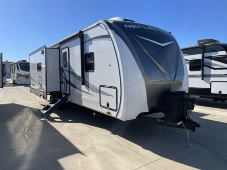 &lt;p&gt;Grand Design Reflection travel trailer 297RSTS highlights:&lt;/p&gt;
&lt;ul&gt;
&lt;li&gt;Outside Kitchen&lt;/li&gt;
&lt;li&gt;Rear Tri-Fold Sofa&lt;/li&gt;
&lt;li&gt;Hutch w/Overhead Cabinets&lt;/li&gt;
&lt;li&gt;Fireplace&lt;/li&gt;
&lt;li&gt;Kitchen Island&lt;/li&gt;
&lt;li&gt;Premium Congoleum Flooring&lt;/li&gt;
&lt;li&gt;Solar Package&lt;/li&gt;
&lt;/ul&gt;
&lt;p&gt;&amp;nbsp;&lt;/p&gt;
&lt;p&gt;Whether you travel to explore or relax, this trailer will give you the choice depending where you park it! The outside kitchen provides another place to make meals when you want to be in the outdoors, and the inside kitchen amenities offer a gourmet kitchen including a&amp;nbsp;10 cu. ft. refrigerator, an island, and a hutch. You and your guests will find&amp;nbsp;theatre seating&amp;nbsp;with cupholders, a booth dinette or choose a free standing dinette option, and a tri-fold sofa to sit on and visit while you watch the&amp;nbsp;40&quot; LED HDTV&amp;nbsp;with fireplace below. The full bathroom includes a space saving sliding door and linen storage, and the bedroom gives you a front walk-around queen bed with storage for your clothes on each side, plus there is an&amp;nbsp;additional wardrobe&amp;nbsp;with drawers and the option to add a washer/dryer to the prepped space.&lt;/p&gt;
&lt;p&gt;&amp;nbsp;&lt;/p&gt;
&lt;p&gt;With any Reflection travel trailer by Grand Design, you will have a solar panel for off-grid camping and a 50 amp charge controller and inverter prep, a Universal All-In-One Docking Station, unobstructed pass-through storage, and nitrogen filled radial tires. Some other top features include the 30&quot; stainless steel microwave, the maximum 7-foot headroom, and the ductless heating system with no vents in the floor to collect debris. Each is constructed of gel coat exterior sidewalls, residential 5&quot; truss rafters, walk-on roof decking, a fiberglass and radiant foil roof and front cap insulation plus laminated aluminum framed side walls, roof and end walls in slide rooms. Choose luxury, value, and towability over all the others, take home a Reflection of your good taste!&lt;/p&gt;