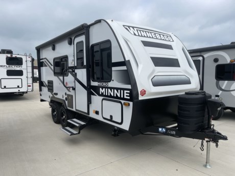 &lt;p class=&quot;MsoNormal&quot;&gt;This Micro Minnie 1800BH by Winnebago is a travel trailer that may be small in size but it can make anywhere feel like home!&lt;/p&gt;
&lt;p class=&quot;MsoNormal&quot;&gt;Step inside the entry door and you will see the Queen bed along the front wall. There is an overhead shelf for storage as well.&lt;/p&gt;
&lt;p class=&quot;MsoNormal&quot;&gt;To the left of the entry door is the kitchen where you will find a three burner stove, oven, double sink, overhead microwave, and refrigerator. You have plenty of storage space thanks to the cabinets and drawers. There is also a TV mounted under the cabinets for perfect viewing from anywhere in the camper.&lt;/p&gt;
&lt;p class=&quot;MsoNormal&quot;&gt;The bathroom is in the left rear corner of the camper. Here you will find a 24&quot;x36&quot; shower and foot pedal flush toilet.&lt;/p&gt;
&lt;p class=&quot;MsoNormal&quot;&gt;The kids bunk beds are in the right rear corner. The bottom bunk bed flips up for extra storage that can be accessed from outside.&lt;/p&gt;
&lt;p class=&quot;MsoNormal&quot;&gt;Opposite the kitchen is the pantry and booth dinette where you can enjoy your meals at or watch TV at.&lt;/p&gt;
&lt;p class=&quot;MsoNormal&quot;&gt;This camper is the perfect weekend getaway so don&#39;t miss out on it! Call or come in today!&lt;/p&gt;