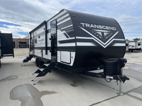 &lt;p class=&quot;MsoNormal&quot;&gt;Grand Design has done it again with another stunning travel trailer! The Transcend XPLOR 265BH packs in tons of features that will make your travel simple and your rest relaxing!&lt;/p&gt;
&lt;p class=&quot;MsoNormal&quot;&gt;Starting outdoors, you will find conveniences like the detachable power cord, black tank flush, electric awning, and pass through storage. All these combines to make your trip easy and no-hassle.&lt;/p&gt;
&lt;p class=&quot;MsoNormal&quot;&gt;Once you step inside though, you will find your home away from home! There is a theater style super sofa that will greet you and provide a spot to sit while catching a flick on the flat screen LED HDTV. Right next to the hutch you will find an AM/FM/CD player!&lt;/p&gt;
&lt;p class=&quot;MsoNormal&quot;&gt;Next, you will probably want to saunter over to the L-shaped kitchen because this trailer provides all the tools necessary to prepare whatever you are hungry for, whether it is a little snack or something scrumptious for all on board! There is a refrigerator, a 3-burner stove top, an oven, a microwave, a sink with sink covers, and tons of storage for all those must-haves. This model comes with a pet drawer below the refrigerator so your dog or cat can have secure food and water on the open road!&lt;/p&gt;
&lt;p class=&quot;MsoNormal&quot;&gt;At the rear are two double bunk beds perfect for bringing the kids or guests along. Next to the bunks is a wardrobe with drawers below. In front of the bunks is a fold and tumble sofa that sleeps two. The mid-cab bathroom which does not skimp on features! You will have a toilet, a shower with shower curtain, a sink, shelves for linens and a mirrored medicine cabinet.&lt;/p&gt;
&lt;p class=&quot;MsoNormal&quot;&gt;The master bedroom is at the front of the trailer and it includes a queen-sized bed with decorative bedspread and surrounding storage! You will be sure to catch lots of ZZZs!&lt;/p&gt;