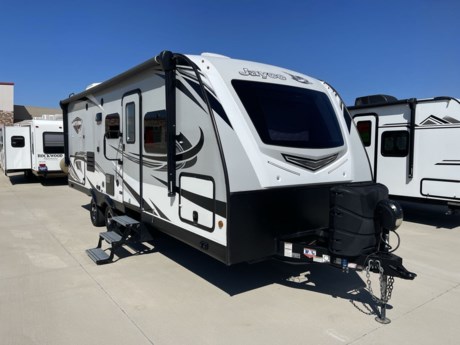 &lt;p&gt;The 2022 Jayco Whitehawk 23MRB is a superb travel trailer that blends modern aesthetics with practical features, catering to discerning travelers seeking comfort and convenience on the road. Measuring approximately 28 feet in length and boasting a dry weight of around 6,000 pounds, this lightweight yet spacious RV offers easy towing and maneuverability without compromising on living space. With its aerodynamic exterior design and sleek graphics, the Whitehawk 23MRB exudes style and sophistication wherever the road takes you.&lt;/p&gt;
&lt;p&gt;Step inside, and you&#39;ll find a thoughtfully designed interior that maximizes comfort and functionality. The spacious living area features residential-style furnishings, including a cozy sofa and a booth dinette, providing ample seating for relaxation or dining. The well-equipped kitchen is complete with modern appliances, solid surface countertops, and abundant storage, making meal preparation a breeze. Additionally, the RV offers a comfortable queen-sized bed in the private bedroom, along with a spacious bathroom featuring a large shower and plenty of storage. With its blend of comfort, style, and practicality, the 2022 Jayco Whitehawk 23MRB is an ideal choice for travelers looking to embark on memorable adventures with all the comforts of home.&lt;/p&gt;
