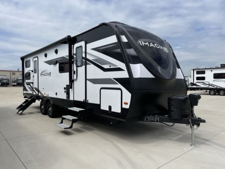 &lt;p class=&quot;MsoNormal&quot;&gt;The Imagine 2800BH lightweight trailer from Grand Design hits the nail on the head! You&amp;rsquo;ll enjoy a huge pass through storage area, exterior speaker with LED lights, and electric awning with LED lights.&lt;/p&gt;
&lt;p class=&quot;MsoNormal&quot;&gt;Stepping into the Imagine 2800BH, you will love the atmosphere set by the Pebble d&amp;eacute;cor, the upgraded leatherette furniture, the large panoramic windows, the LED lighting, and the&amp;nbsp;cabinet doors. Upon entering, you&amp;rsquo;ll want to relax while sitting in the theater seats while you catch a movie on the flat screen TV mounted into the entertainment center!&lt;/p&gt;
&lt;p class=&quot;MsoNormal&quot;&gt;Next, you&amp;rsquo;ll find a charming kitchen with spacious countertops and stainless-steel appliances such as the microwave, the stove top with oven below, the large sink, and the double door refrigerator. One unique feature of this kitchen is the slide out pet dish below the refrigerator! After preparing a tasty the family can gather at the booth dinette to eat or to play a fun game!&lt;/p&gt;
&lt;p class=&quot;MsoNormal&quot;&gt;In the bathroom, you&amp;rsquo;ll find a 30&amp;rdquo;x36&amp;rdquo; shower with a skylight and glass doors, a power vent fan, a toilet, and a mirrored medicine cabinet!&lt;/p&gt;
&lt;p class=&quot;MsoNormal&quot;&gt;At the rear are two double bunks with bike storage! You know you will always have room for everyone on board as well as room to store everyone&amp;rsquo;s belongings!&lt;/p&gt;
&lt;p class=&quot;MsoNormal&quot;&gt;The bedroom is located at the front of the trailer and contains dazzling amenities like the 60&amp;rdquo;x80&amp;rdquo; bed, a solid sliding bedroom door, oversized under bed storage, and a residential bed spread. You also can&amp;rsquo;t forget all of the overhead and bedside storage!&lt;/p&gt;
&lt;p class=&quot;MsoNormal&quot;&gt;The Imagine 2800BH makes it possible to travel light and in style! So, stop imagining and stop in today to see all of these awesome features for yourself!&lt;/p&gt;