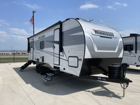 &lt;p&gt;The 2024 Winnebago Access 26RL is a versatile and stylish recreational vehicle (RV) designed to enhance your travel experiences. Its sleek exterior features a durable construction with ample storage compartments and a large powered awning, providing both convenience and comfort for outdoor relaxation. Inside, the living area boasts modern decor and furnishings, including plush seating options and a fully equipped kitchen with premium appliances. The bathroom is well-appointed with a shower, toilet, and sink, while the sleeping quarters offer a cozy bed and ample storage space for personal belongings. Climate control ensures a comfortable interior temperature, and entertainment options such as a flat-screen TV and sound system offer enjoyment on the road. Mechanically, the RV is equipped with a reliable drivetrain, advanced suspension system, and integrated backup camera for added safety and convenience during maneuvers. Optional solar panels provide eco-friendly and off-grid capabilities, enhancing the vehicle&#39;s versatility. With its blend of style, comfort, and functionality, the 2024 Winnebago Access 26RL is an ideal companion for unforgettable adventures.&lt;/p&gt;