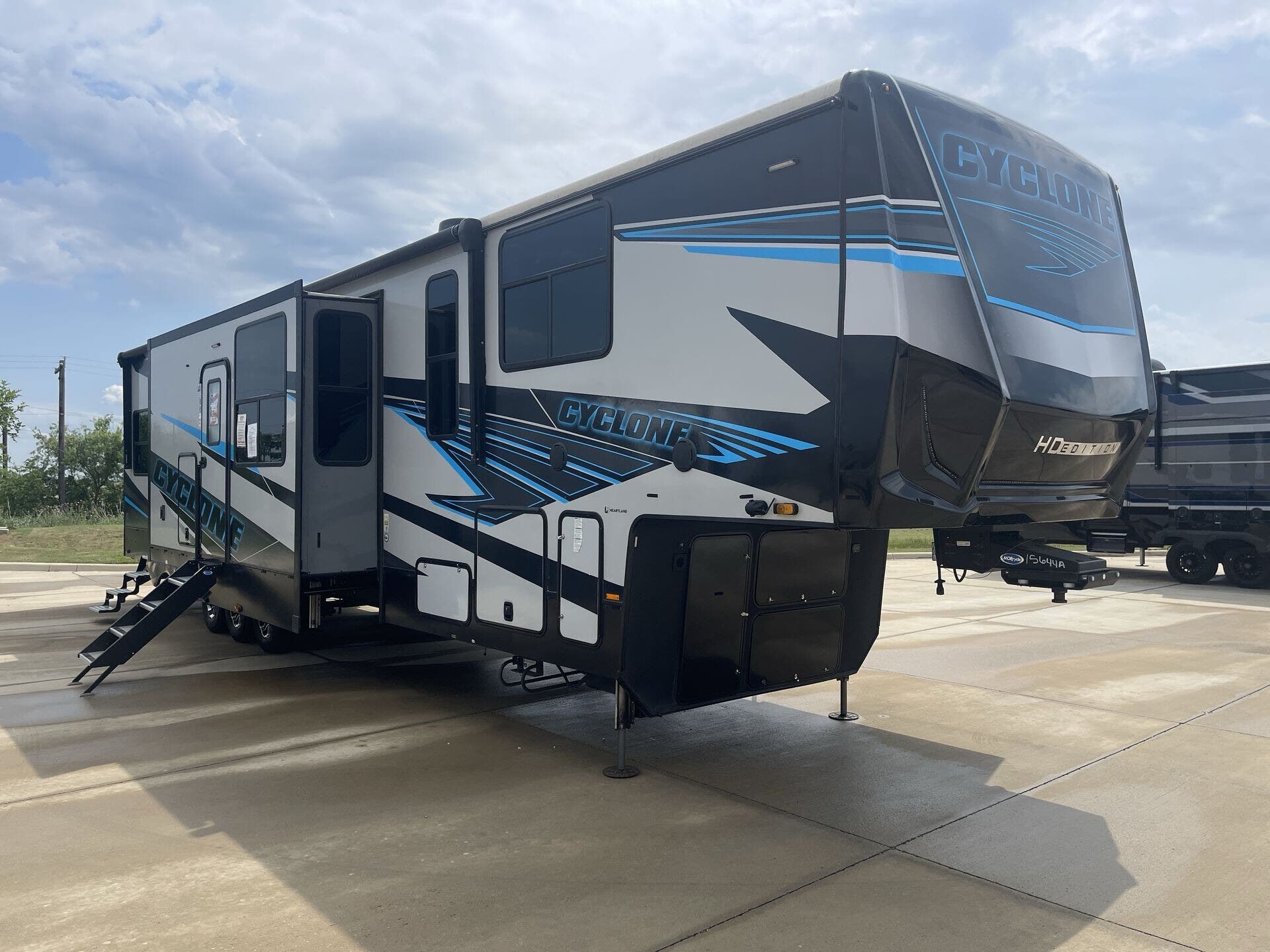 2024 Heartland Cyclone 4006 - Used Fifth Wheel For Sale by McClain's Longhorn RV in Sanger, Texas features Refrigerator, Shower, Fireplace, Theater Seating, 50 Amp Service