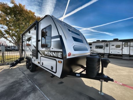 &lt;p&gt;&amp;nbsp;&lt;/p&gt;
&lt;p&gt;Introducing the 2024 Winnebago Micro Minnie 1821FBS, a compact and versatile travel trailer that redefines the art of on-the-go living. This lightweight wonder is designed for adventurers who seek the perfect balance between functionality and comfort. With its thoughtful layout and modern amenities, the Micro Minnie 1821FBS offers a delightful travel experience for couples or small families.&lt;/p&gt;
&lt;p&gt;Measuring at just the right size, the 1821FBS combines nimble towing with a surprisingly spacious interior. The exterior showcases Winnebago&#39;s commitment to durability and aerodynamic design, making it easy to maneuver on the open road. Its sleek profile is complemented by stylish graphics and premium finishes, ensuring that you travel in both style and substance.&lt;/p&gt;
&lt;p&gt;Step inside, and you&#39;ll be greeted by a smartly designed living space that maximizes every inch. The open floor plan seamlessly integrates the kitchen, dining, and living areas, creating a welcoming atmosphere for socializing or relaxation. The kitchen is equipped with modern appliances, ample storage, and a functional workspace, allowing you to prepare delicious meals on the go.&lt;/p&gt;
&lt;p&gt;The cozy sleeping quarters feature a comfortable bed and clever storage solutions, making the most of the available space. The bathroom is both efficient and stylish, featuring a shower, toilet, and vanity with all the comforts of home. Large windows throughout the trailer provide natural light and panoramic views, connecting you with the beauty of your surroundings.&lt;/p&gt;
&lt;p&gt;The 1821FBS is equipped with cutting-edge technology to enhance your travel experience. From entertainment systems to climate control, Winnebago has integrated the latest features to keep you connected and comfortable. The trailer&#39;s energy-efficient design and eco-friendly components contribute to a sustainable and responsible travel lifestyle.&lt;/p&gt;
&lt;p&gt;Whether you&#39;re embarking on a weekend getaway or an extended road trip, the 2024 Winnebago Micro Minnie 1821FBS is your ticket to adventure. Compact, stylish, and brimming with thoughtful features, this travel trailer is poised to be the ideal companion for those who crave the freedom of the open road without compromising on the comforts of home.&lt;/p&gt;