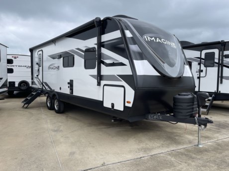 &lt;div style=&quot;box-sizing: border-box; outline: none; font-family: Muli, sans-serif; font-size: 16px;&quot;&gt;&lt;span style=&quot;box-sizing: border-box; font-weight: bold;&quot;&gt;Grand Design Imagine travel trailer 2600RB highlights:&lt;/span&gt;&lt;/div&gt;
&lt;ul style=&quot;box-sizing: border-box; margin-top: 0px; margin-bottom: 10px; font-family: Muli, sans-serif; font-size: 16px;&quot;&gt;
&lt;li style=&quot;box-sizing: border-box;&quot;&gt;Rear Full Bath&lt;/li&gt;
&lt;li style=&quot;box-sizing: border-box;&quot;&gt;Tri-Fold Sofa&lt;/li&gt;
&lt;li style=&quot;box-sizing: border-box;&quot;&gt;U-Shaped Dinette&lt;/li&gt;
&lt;li style=&quot;box-sizing: border-box;&quot;&gt;Pet Dish&lt;/li&gt;
&lt;li style=&quot;box-sizing: border-box;&quot;&gt;Skylight Over Shower&lt;/li&gt;
&lt;/ul&gt;
&lt;div style=&quot;box-sizing: border-box; outline: none; font-family: Muli, sans-serif; font-size: 16px;&quot;&gt;&amp;nbsp;&lt;/div&gt;
&lt;div style=&quot;box-sizing: border-box; outline: none; font-family: Muli, sans-serif; font-size: 16px;&quot;&gt;You will be able to bring along your favorite furry friend in this&amp;nbsp;&lt;span style=&quot;box-sizing: border-box; font-weight: bold;&quot;&gt;pet-friendly&lt;/span&gt;&amp;nbsp;Imagine travel trailer! There is a pet dish that you can use to feed your pup, and when you enter this trailer, you&#39;ll find convenient shoe storage to your right below the wardrobe/pantry. The full rear bathroom has a 30&quot; x 36&quot; shower with skylight for you to rinse off after you come in from an afternoon hike, and you can lounge on the tri-fold sofa or U-shaped&amp;nbsp;&lt;span style=&quot;box-sizing: border-box; font-weight: bold;&quot;&gt;dinette with removable ottoman&lt;/span&gt;&amp;nbsp;after you are clean. The&lt;span style=&quot;box-sizing: border-box; font-weight: bold;&quot;&gt;&amp;nbsp;large slide&lt;/span&gt;&amp;nbsp;creates more interior space, so you can cook freely on the three-burner range with oven in the kitchen. You&#39;ll have a&amp;nbsp;&lt;span style=&quot;box-sizing: border-box; font-weight: bold;&quot;&gt;private bedroom&lt;/span&gt;&amp;nbsp;that you can retreat to at the end of a long day, and the 60&quot; x 80&quot; queen bed will provide comfort while you sleep.&lt;/div&gt;
&lt;div style=&quot;box-sizing: border-box; outline: none; font-family: Muli, sans-serif; font-size: 16px;&quot;&gt;&amp;nbsp;&lt;/div&gt;
&lt;div style=&quot;box-sizing: border-box; outline: none; font-family: Muli, sans-serif; font-size: 16px;&quot;&gt;Just imagine leaving the world behind and secluding yourself away with your favorite people in your Grand Design Imagine travel trailer! The Imagine has been designed to enjoy extended season camping and includes a&amp;nbsp;&lt;span style=&quot;box-sizing: border-box; font-weight: bold;&quot;&gt;high-capacity furnace&lt;/span&gt;, a heated and enclosed underbelly with suspended tanks, a designated heat duct to the subfloor, and a high-density roof insulation with attic vent. You&#39;ll have maximum head room on the interior with 81&quot; radius ceilings, and large panoramic windows to let in natural lighting. The exclusive&amp;nbsp;&lt;span style=&quot;box-sizing: border-box; font-weight: bold;&quot;&gt;drop-frame pass-through storage&lt;/span&gt;&amp;nbsp;compartment is going to allow you to bring along lots of equipment, and the&amp;nbsp;&lt;span style=&quot;box-sizing: border-box; font-weight: bold;&quot;&gt;universal docking station&lt;/span&gt;&amp;nbsp;is an all-in-one location for utilities and hook-ups. You&#39;ll also have&amp;nbsp;&lt;span style=&quot;box-sizing: border-box; font-weight: bold;&quot;&gt;industry-leading tank capacities&lt;/span&gt;&amp;nbsp;so that you can fill and empty your tanks less often.&lt;/div&gt;