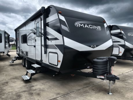 &lt;p style=&quot;box-sizing: border-box; margin: 0px 0px 10px; font-family: &#39;Source Sans Pro&#39;, sans-serif; font-size: 16px;&quot;&gt;&lt;span style=&quot;box-sizing: border-box; font-weight: bold;&quot;&gt;Grand Design Imagine XLS travel trailer 23LDE highlights:&lt;/span&gt;&lt;/p&gt;
&lt;ul style=&quot;box-sizing: border-box; margin-top: 0px; margin-bottom: 10px; font-family: &#39;Source Sans Pro&#39;, sans-serif; font-size: 16px;&quot;&gt;
&lt;li style=&quot;box-sizing: border-box;&quot;&gt;Private Bedroom&lt;/li&gt;
&lt;li style=&quot;box-sizing: border-box;&quot;&gt;Dual Entry&lt;/li&gt;
&lt;li style=&quot;box-sizing: border-box;&quot;&gt;Walk-Through Bath&lt;/li&gt;
&lt;li style=&quot;box-sizing: border-box;&quot;&gt;Single Slide&lt;/li&gt;
&lt;li style=&quot;box-sizing: border-box;&quot;&gt;20&#39; Electric Awning&lt;/li&gt;
&lt;/ul&gt;
&lt;p style=&quot;box-sizing: border-box; margin: 0px 0px 10px; font-family: &#39;Source Sans Pro&#39;, sans-serif; font-size: 16px;&quot;&gt;&amp;nbsp;&lt;/p&gt;
&lt;p style=&quot;box-sizing: border-box; margin: 0px 0px 10px; font-family: &#39;Source Sans Pro&#39;, sans-serif; font-size: 16px;&quot;&gt;Treat yourself to a weekend of fun in this Imagine XLS travel trailer! Whether it&#39;s just you and your spouse, or you&#39;ve chosen to bring along a group of friends, this trailer will meet the need. The front bedroom can sleep two people on the&amp;nbsp;&lt;span style=&quot;box-sizing: border-box; font-weight: bold;&quot;&gt;walk-around queen-size bed&lt;/span&gt;. The bedroom is quite functional because it not only contains the second exterior entry door, but it also has a private entrance into the walk-through bathroom since it is located on the other side of the bathroom. The&amp;nbsp;&lt;span style=&quot;box-sizing: border-box; font-weight: bold;&quot;&gt;booth dinette&lt;/span&gt;&amp;nbsp;is functional too because it can transform from a dining location into a sleeping location, and the&amp;nbsp;&lt;span style=&quot;box-sizing: border-box; font-weight: bold;&quot;&gt;theater seating&lt;/span&gt;&amp;nbsp;is directly across from the 32&quot; LED TV for easy viewing. When you enter through the entry door that is right next to the rear kitchen, you&#39;ll be able to take off your shoes and put them in the&lt;span style=&quot;box-sizing: border-box; font-weight: bold;&quot;&gt;&amp;nbsp;shoe storage&lt;/span&gt;&amp;nbsp;below the dinette.&amp;nbsp;&lt;/p&gt;
&lt;p style=&quot;box-sizing: border-box; margin: 0px 0px 10px; font-family: &#39;Source Sans Pro&#39;, sans-serif; font-size: 16px;&quot;&gt;&amp;nbsp;&lt;/p&gt;
&lt;p style=&quot;box-sizing: border-box; margin: 0px 0px 10px; font-family: &#39;Source Sans Pro&#39;, sans-serif; font-size: 16px;&quot;&gt;Let your imagination run wild with the possibilities that the Grand Design Imagine XLS travel trailer can provide! The Imagine XLS has been built with oversized tank capacities, an extra-large 2&quot; fresh water drain valve, a ducted A/C system, a&amp;nbsp;&lt;span style=&quot;box-sizing: border-box; font-weight: bold;&quot;&gt;power tongue jack&lt;/span&gt;, and a heated and enclosed underbelly with suspended tanks. There is a designated heat duct to the subfloor and a&amp;nbsp;&lt;span style=&quot;box-sizing: border-box; font-weight: bold;&quot;&gt;residential ductless heating system&lt;/span&gt;&amp;nbsp;throughout. For outdoor adventures, the electric awning with LED lights will enable you to stay protected, and the&lt;span style=&quot;box-sizing: border-box; font-weight: bold;&quot;&gt;&amp;nbsp;exterior speakers&lt;/span&gt;&amp;nbsp;make any time outside a party.&amp;nbsp;You will also love the&amp;nbsp;&lt;span style=&quot;box-sizing: border-box; font-weight: bold;&quot;&gt;XLS Solar Package&lt;/span&gt;&amp;nbsp;that comes with a 165W roof mounted solar panel, a 25 Amp charge controller, a 12V 10 cu. ft. refrigerator, and roof mounted quick connect plugs!&lt;/p&gt;