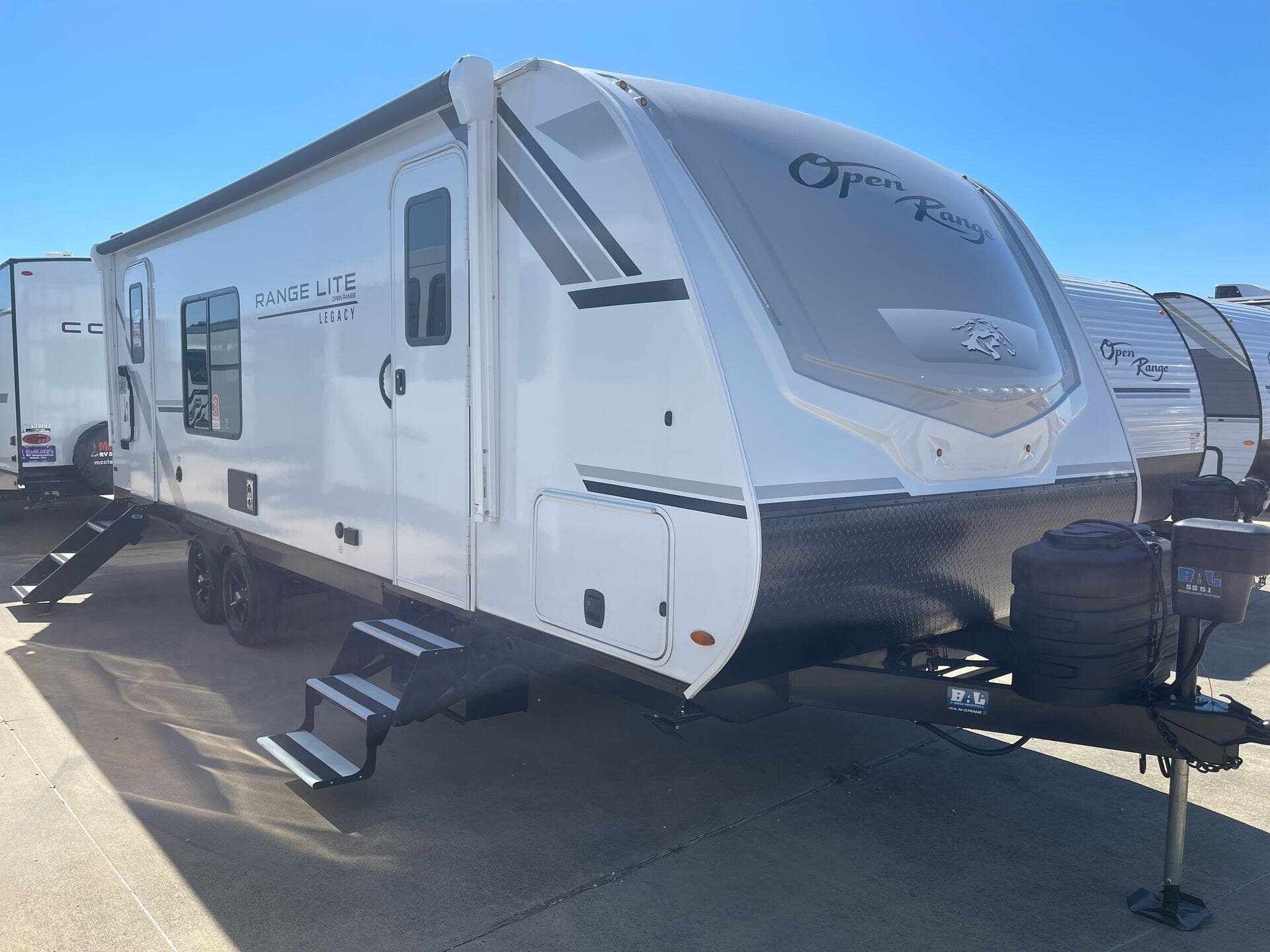2026 Highland Ridge Open Range Light 230MKD - New Travel Trailer For Sale by McClain's RV Fort Worth in Fort Worth, Texas features Power Awning, Murphy Bed, PVC Roof, Ladder, Water Heater