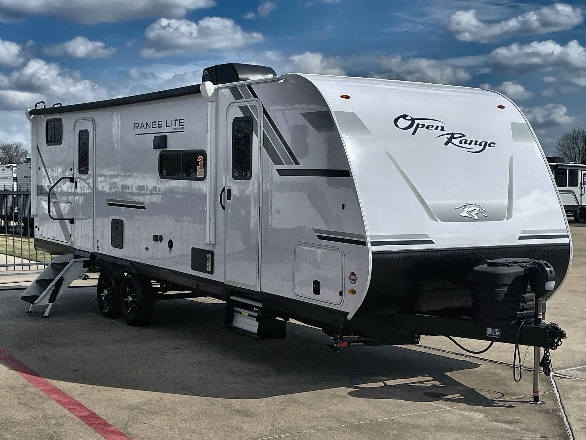 2026 Highland Ridge Open Range LITE 270DBL - New Travel Trailer For Sale by McClain's RV Fort Worth in Fort Worth, Texas features Toilet, Detachable Power Cord, Refrigerator, Queen Bed, Murphy Bed