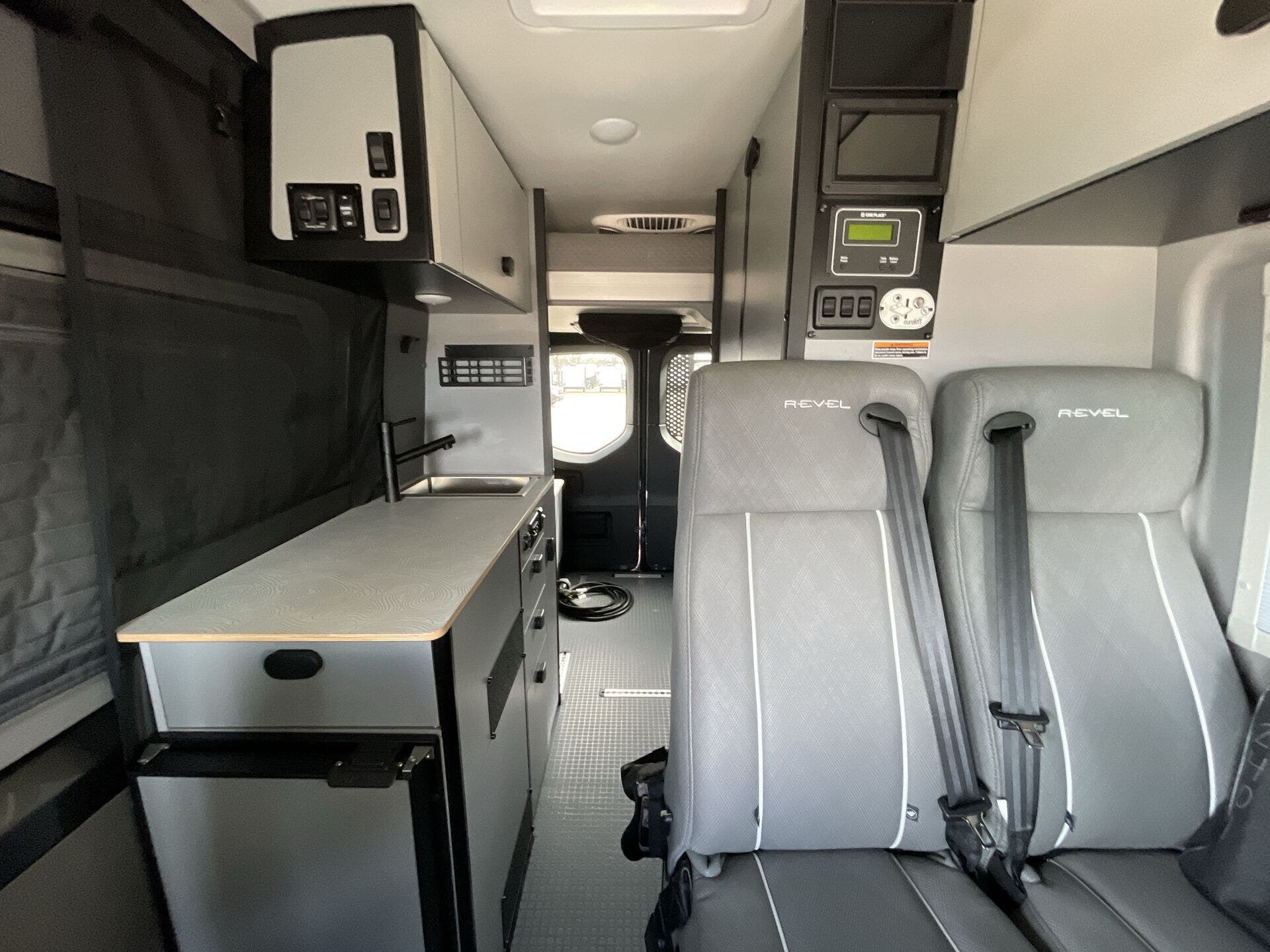 2025 Winnebago Revel 2.5 44E - Used Class B For Sale by McClain's RV Fort Worth in Fort Worth, Texas features Ladder, Converter, Shower, Screen Door, Power Lift