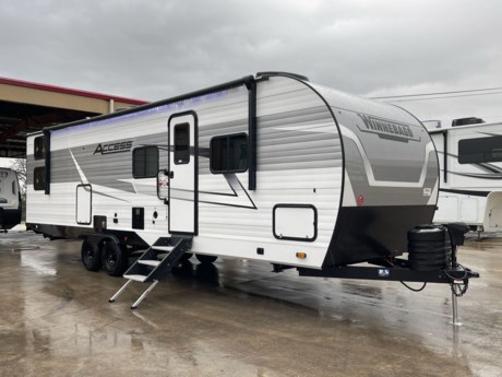 &lt;p class=&quot;MsoNormal&quot;&gt;&lt;span style=&quot;font-size: 12.0pt; line-height: 107%; font-family: &#39;Arial&#39;,sans-serif;&quot;&gt;The 2024 Winnebago Access 30BH is a versatile and family-friendly Class C motorhome that offers the perfect blend of comfort and functionality for all your RV adventures. This spacious motorhome is designed to accommodate families or large groups, making it an ideal choice for extended road trips or weekend getaways. With its user-friendly features and thoughtful layout, the Access 30BH provides a home-away-from-home experience on the open road.&lt;/span&gt;&lt;/p&gt;
&lt;p class=&quot;MsoNormal&quot;&gt;&lt;span style=&quot;font-size: 12.0pt; line-height: 107%; font-family: &#39;Arial&#39;,sans-serif;&quot;&gt;Inside, the Access 30BH boasts a well-designed floorplan that optimizes space and comfort. The main living area is equipped with a comfortable dinette, a sofa, and a well-appointed kitchen, complete with a range, microwave, and ample storage. The private master bedroom features a walk-around queen bed, while the rear bunkhouse provides sleeping space for the kids or additional guests. The bathroom is spacious and includes a shower for added convenience. The motorhome also comes with modern amenities, such as an entertainment system and a touchscreen control panel, ensuring that your journey is as enjoyable as your destination. The 2024 Winnebago Access 30BH is a superb choice for families seeking a comfortable and functional motorhome that can accommodate the entire crew while offering all the conveniences of home on the road.&lt;/span&gt;&lt;/p&gt;