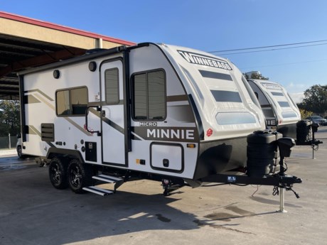 &lt;p class=&quot;MsoNormal&quot;&gt;&lt;span style=&quot;font-size: 12.0pt; line-height: 107%; font-family: &#39;Arial&#39;,sans-serif;&quot;&gt;The Winnebago Micro Minnie 1700BH is a super lightweight travel trailer that is built for the road!&lt;/span&gt;&lt;/p&gt;
&lt;p class=&quot;MsoNormal&quot;&gt;&lt;span style=&quot;font-size: 12.0pt; line-height: 107%; font-family: &#39;Arial&#39;,sans-serif;&quot;&gt;This little bunkhouse camper has 4-corner stabilizer jacks, exterior speakers, alloy wheels, an electric tongue jack, and a power patio awning. In the rear, you have two bunks next to an enclosed bathroom with a toilet and shower.&lt;/span&gt;&lt;/p&gt;
&lt;p class=&quot;MsoNormal&quot;&gt;&lt;span style=&quot;font-size: 12.0pt; line-height: 107%; font-family: &#39;Arial&#39;,sans-serif;&quot;&gt;There is a full kitchenette on one wall that has a sink, stove, convection microwave, and a refrigerator.&amp;nbsp;&lt;/span&gt;&lt;span style=&quot;font-size: 12.0pt; line-height: 107%; font-family: &#39;Arial&#39;,sans-serif;&quot;&gt;Across from the kitchen is a dinette booth that converts into an extra bed.&lt;/span&gt;&lt;/p&gt;
&lt;p class=&quot;MsoNormal&quot;&gt;&lt;span style=&quot;font-size: 12.0pt; line-height: 107%; font-family: &#39;Arial&#39;,sans-serif;&quot;&gt;Finally, there is a full-size bed in the front with storage above and below. The Micro Minnie has a dry weight of about 3,000 pounds, so you can tow it with almost anything. Call, email, or just come by and check it out!&lt;/span&gt;&lt;/p&gt;