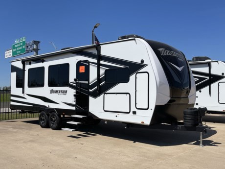 &lt;p class=&quot;MsoNormal&quot;&gt;&lt;span style=&quot;font-size: 16px; line-height: 107%; font-family: Arial, sans-serif;&quot;&gt;Grand Design has combined all of the best things about a travel trailer and combined them with the functionality of a toy hauler to create one incredible RV! The Momentum 28G is jam-packed with amazing features like pass thru storage, tinted windows, exterior security lights, and a power patio awning with integrated LED lighting.&lt;/span&gt;&lt;/p&gt;
&lt;p class=&quot;MsoNormal&quot;&gt;&lt;span style=&quot;font-size: 16px; line-height: 107%; font-family: Arial, sans-serif;&quot;&gt;Inside, the Momentum 28G is full of luxurious amenities such as recessed LED ceiling lighting, blue LED accent lighting, the decor, and beautiful raised panel hardwood cabinet doors with hidden hinges. Cooking lunch or dinner will be a breeze in this exquisite kitchen. The sink covers, 3-burner stove top with oven below, and microwave will ensure you have all the tools you need! But perhaps the best part of this kitchen is the refrigerator and storage space!&lt;/span&gt;&lt;/p&gt;
&lt;p class=&quot;MsoNormal&quot;&gt;&lt;span style=&quot;font-size: 16px; line-height: 107%; font-family: Arial, sans-serif;&quot;&gt;Across from the kitchen, you&#39;ll find two comfy rocker recliners! What an amazing feature and a relaxing place to put up your feet at the end of the day?! Need a place to sit for dinner? This model also comes with a removable table that can be set up to create a nice place to gather the family for dinner!&lt;/span&gt;&lt;/p&gt;
&lt;p class=&quot;MsoNormal&quot;&gt;&lt;span style=&quot;font-size: 16px; line-height: 107%; font-family: Arial, sans-serif;&quot;&gt;The garage is located at the back of the trailer and provides plenty of space to not only bring along your favorite toys but also to accommodate more friends and family with the Happi-Jac electric bunk system with fold and tumble sofas. This particular model also comes with a rear garage ramp door and Rockford Fosgate Speakers!!I&lt;/span&gt;&lt;/p&gt;
&lt;p class=&quot;MsoNormal&quot;&gt;&lt;span style=&quot;font-size: 16px; line-height: 107%; font-family: Arial, sans-serif;&quot;&gt;In the middle of the galley, you will find a convenient bathroom with amenities like a mirrored medicine cabinet, a toilet, a one-piece fiberglass shower with skylight and a sink. The exquisite bedroom is located at the front as well and ensures you will rest easy in a queen-sized bed with a beautiful bedspread. But that&#39;s not all! You&#39;ll also appreciate the generous amount of storage in the mirrored dresser next to the bed.&lt;/span&gt;&lt;/p&gt;
&lt;p class=&quot;MsoNormal&quot;&gt;&lt;span style=&quot;font-size: 16px; line-height: 107%; font-family: Arial, sans-serif;&quot;&gt;Come take a look at the Grand Design Momentum 28G or contact us for more information.&lt;/span&gt;&lt;/p&gt;