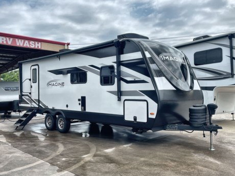 &lt;p class=&quot;MsoNormal&quot;&gt;&lt;span style=&quot;font-size: 16px; line-height: 107%; font-family: arial, helvetica, sans-serif;&quot;&gt;Looking for the perfect rear bath couple&#39;s camper? Look no further than this 2020 Grand Design Imagine 2600RB! Step inside and find the huge bath room immediately to your left. Here you will find a shower with skylight, linen cabinet, toilet, and a vanity with sink, plus overhead storage and tons of counter space. Directly across from the entry door are the heated massage theatre seating recliners within a slide out along with the free standing table with chairs. Relax and watch your favorite shows on the HDTV in the entertainment center next to the kitchen. You will also find a three burner range with overhead microwave oven, countertop space for making meals and snacks, and a large sink for cleaning the dishes along the interior wall. The front features a spacious bedroom with a comfy queen size bed, dual bedside wardrobes for storage, and overhead cabinets. The space saving sliding door provides privacy when needed, and a real open feeling when you don&#39;t! Stop by today and take a look at this amazing Imagine 2600RB!&lt;/span&gt;&lt;/p&gt;