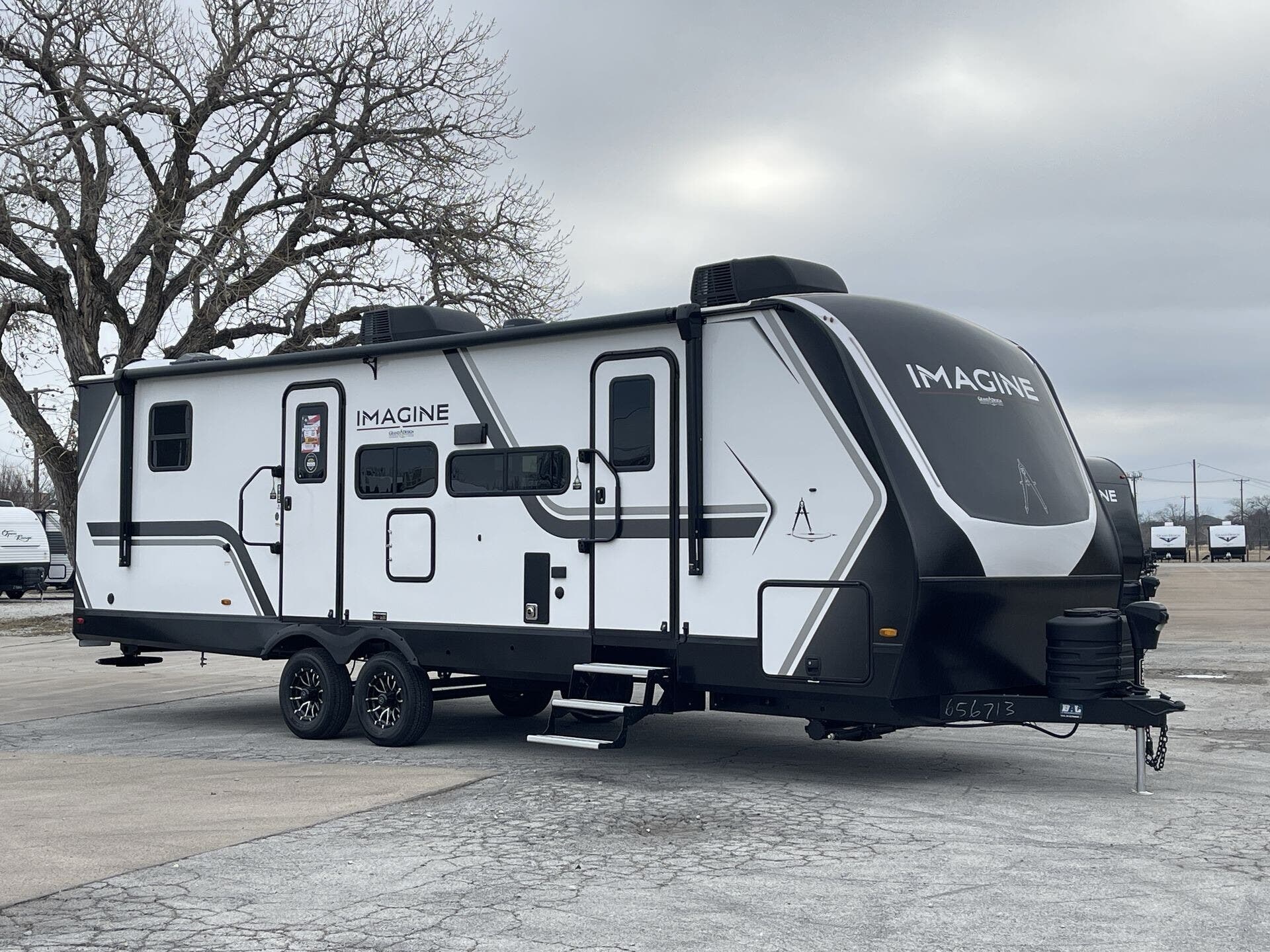 2026 Grand Design Imagine 2810BH - New Travel Trailer For Sale by McClain's RV Superstore in Corinth, Texas features Insulated, Kitchen Sink, Fire Extinguisher, Pantry, Roof Vents