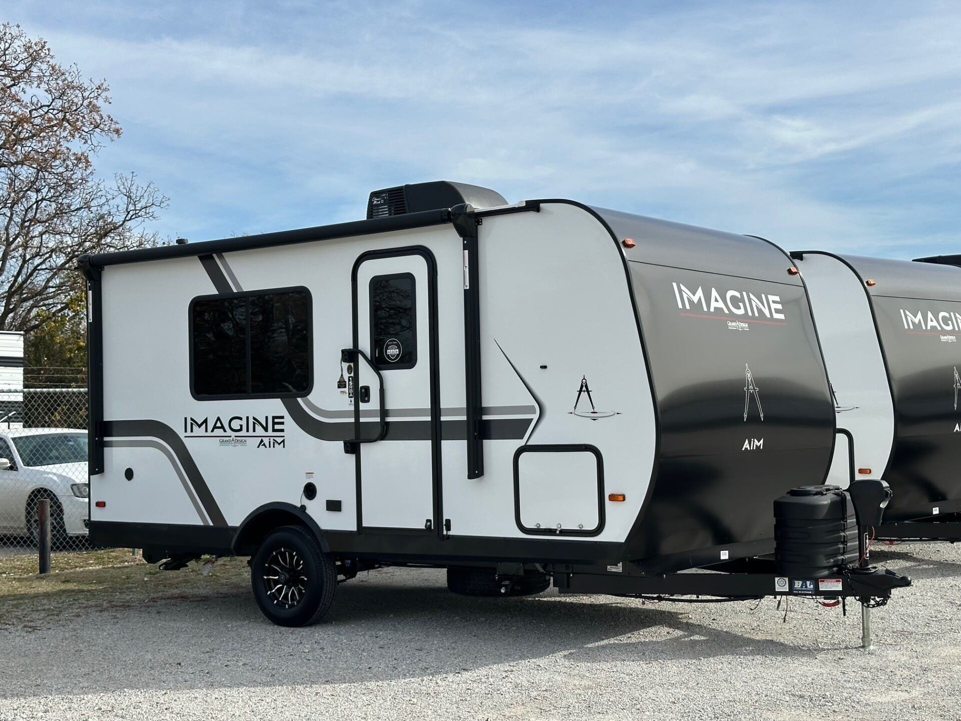 2026 Grand Design Imagine AIM 15RBA - New Travel Trailer For Sale by McClain's RV Superstore in Corinth, Texas features Refrigerator, Convection Microwave, Shower, Water Heater, Power Awning