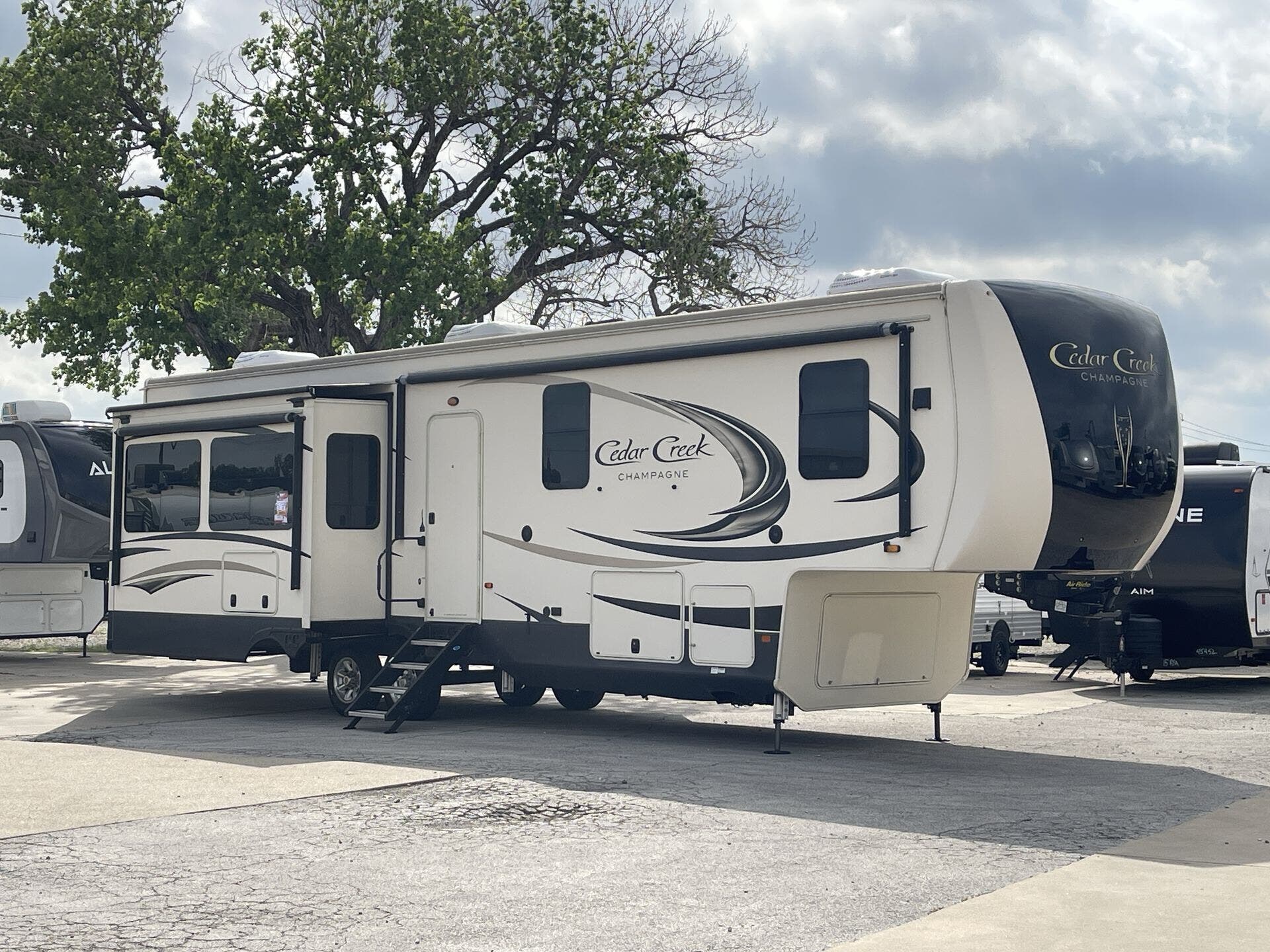 2020 Forest River Cedar Creek 38EL - Used Fifth Wheel For Sale by McClain's RV Superstore in Corinth, Texas features Wardrobe(s), Central Vacuum, Fireplace, Toilet, Inverter