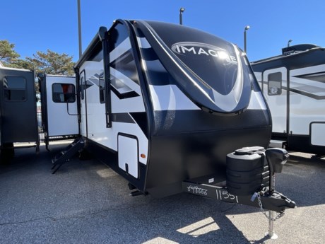 &lt;p&gt;&lt;strong&gt;Discover Your Dream Getaway with the 2024 Grand Design Imagine 2970RL Travel Trailer&lt;/strong&gt;&lt;/p&gt;
&lt;p&gt;Are you ready to embark on the journey of a lifetime? Look no further than the 2024 Grand Design Imagine 2970RL, a travel trailer that combines modern comfort, style, and versatility for unforgettable adventures. Whether you&#39;re an experienced RVer or new to the camping lifestyle, this Imagine 2970RL is designed to provide you with an exceptional and enjoyable travel experience.&lt;/p&gt;
&lt;p&gt;&lt;strong&gt;Spacious and Stylish Interior:&lt;/strong&gt; Step inside, and you&#39;ll be greeted by a spacious and stylish interior that&#39;s perfect for relaxation and entertainment. The living area features a comfortable sofa, theater-style recliners, a cozy fireplace, and a large flat-screen TV. Large windows provide abundant natural light and offer breathtaking views.&lt;/p&gt;
&lt;p&gt;&lt;strong&gt;Gourmet Kitchen:&lt;/strong&gt; The kitchen is a chef&#39;s dream, equipped with top-of-the-line appliances, including a stove, convection microwave, residential refrigerator, and ample storage space for your kitchen essentials. Solid surface countertops and a kitchen island make meal preparation a breeze.&lt;/p&gt;
&lt;p&gt;&lt;strong&gt;Private Master Suite:&lt;/strong&gt; The Imagine 2970RL offers a private master suite that&#39;s a sanctuary of comfort and tranquility. It features a comfortable queen-sized bed, wardrobes, and additional storage space. The attached bathroom boasts a residential shower, a vanity, and a closet for your convenience.&lt;/p&gt;
&lt;p&gt;&lt;strong&gt;Modern Amenities:&lt;/strong&gt; This travel trailer is equipped with modern amenities to enhance your camping experience. Stay comfortable year-round with efficient heating and air conditioning systems. Enjoy entertainment on the road with a premium sound system, multiple flat-screen TVs, and multimedia connections. Energy-efficient LED lighting fixtures add a modern touch.&lt;/p&gt;
&lt;p&gt;&lt;strong&gt;Outdoor Enjoyment:&lt;/strong&gt; The exterior of the Imagine 2970RL is designed for outdoor living, featuring an electric awning, outdoor speakers, and storage compartments for your gear and equipment. You can savor the great outdoors while enjoying all the comforts of home.&lt;/p&gt;
&lt;p&gt;&lt;strong&gt;Adventure Awaits:&lt;/strong&gt; The 2024 Grand Design Imagine 2970RL is your ticket to unforgettable adventures. Whether you&#39;re exploring national parks, camping by a serene lake, or simply hitting the open road to new destinations, this travel trailer offers the comforts of home wherever your journey takes you.&lt;/p&gt;