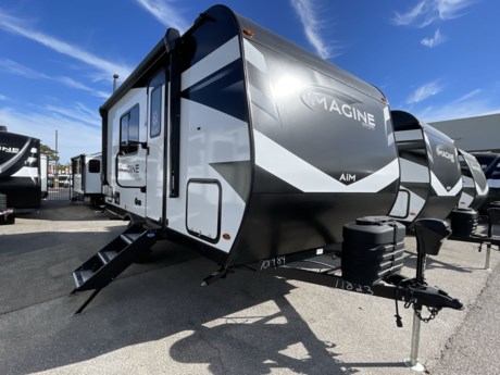 &lt;p&gt;Introducing the 2024 Grand Design Imagine AIM 15RB, a compact and versatile travel trailer designed for those seeking a comfortable and easy-to-tow RV experience. The Imagine AIM series is known for its practical features and quality construction, making it an excellent choice for adventurers on the go.&lt;/p&gt;
&lt;p&gt;&lt;strong&gt;Compact and Lightweight:&lt;/strong&gt; The AIM 15RB is designed with compact dimensions and a lightweight build, making it an ideal choice for those who prioritize easy towing and maneuverability. Its streamlined design ensures effortless travel on various terrains.&lt;/p&gt;
&lt;p&gt;&lt;strong&gt;Cozy Interior:&lt;/strong&gt; Step into a cozy interior that maximizes space efficiency. The layout of the 15RB is designed to provide a comfortable living space, making it perfect for couples or small families looking for a snug retreat on their journeys.&lt;/p&gt;
&lt;p&gt;&lt;strong&gt;Comfortable Sleeping Area:&lt;/strong&gt; The 15RB features a dedicated sleeping area with a comfortable bed, ensuring a good night&#39;s sleep after a day of exploration and adventure. The interior design prioritizes comfort and functionality.&lt;/p&gt;
&lt;p&gt;&lt;strong&gt;Functional Kitchen:&lt;/strong&gt; Despite its compact size, the Grand Design Imagine AIM 15RB comes equipped with a functional kitchen area. Amenities include a stove, sink, and refrigerator, providing the essentials for preparing meals on the road.&lt;/p&gt;
&lt;p&gt;&lt;strong&gt;Dining Space:&lt;/strong&gt; Enjoy your meals in the designated dining space, which include a comfortable seating arrangement. This area serves as a central hub for shared meals and cozy gatherings.&lt;/p&gt;
&lt;p&gt;&lt;strong&gt;Convenient Bathroom Facilities:&lt;/strong&gt; The 15RB features a well-designed bathroom with essential facilities, including a toilet, sink, and shower. The compact yet functional bathroom layout ensures convenience during your travels.&lt;/p&gt;
&lt;p&gt;&lt;strong&gt;Outdoor Enjoyment:&lt;/strong&gt; The Grand Design Imagine AIM 15RB is designed for outdoor enjoyment, with an awning for shade and relaxation. Embrace the outdoor lifestyle and create memorable moments under the open sky.&lt;/p&gt;
&lt;p&gt;&lt;strong&gt;Quality Construction:&lt;/strong&gt; Grand Design is known for its commitment to quality construction, and the AIM 15RB reflects this dedication. Durable materials and attention to detail ensure a travel trailer that stands up to the rigors of travel&lt;/p&gt;