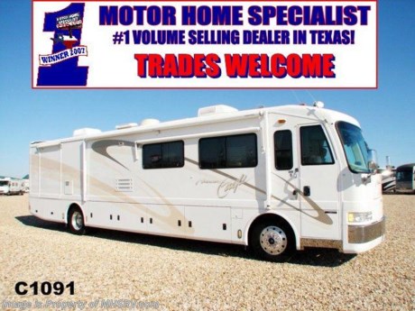 &lt;a href=&quot;http://www.mhsrv.com/other-rvs-for-sale/american-coach-rv/&quot;&gt;&lt;img src=&quot;http://www.mhsrv.com/images/sold-americancoach.jpg&quot; width=&quot;383&quot; height=&quot;141&quot; border=&quot;0&quot; /&gt;&lt;/a&gt;
Pre-Owned RV SOLD 07/16/09 - *Consignment Unit* 2000 American Eagle 40&#39; W/ 2 Slides, 40EVS floor plan. MOTIVATED SELLER, Will consider all offers! This RV comes equipped with a 350HP diesel engine on the Spartan chassis with Independent Front Suspension, an Allison 6-speed transmission, Onan&#39;s 7.5K quiet diesel generator, Power Gear hydraulic levelers, full air ride suspension with air brakes &amp; ABS, dual ducted roof A/Cs, aluminum wheels, clear guard front protection, fully automatic satellite system, FIBERGLASS ROOF, (3) solar panels, basement freezer on slide tray, patio &amp; window awnings, full leather pilot &amp; co-pilot seats with electric controls including lumbar and power foot rest on passenger side, tilt-telescopic wheel, cab fans, chrome power remote mirrors with defrost, 10-disc CD changer, Alpine Navigation system, two TVs, Bose surround sound, dual leather sofas, ceramic tile flooring, solid surface counters, double door refrigerator, convection microwave, two burner range, U-Line ice maker, dual pane insulated windows, day/night shades, split bath with private toilet, rear slide closet, full pass through basement storage with slide-out cargo trays, basement freezer on slide tray, 10K hitch receiver, rear ladder, 50 amp shore cord, 10 gallon water heater, 40 g. LPG, front generator access, and 100K miles. 
