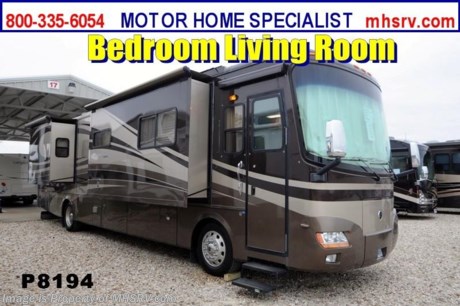/MN 12/2013 Used Holiday Rambler RV for Sale- 2007 Holiday Rambler Ambassador 40PLQ with 4 slides and 33,348 miles. This RV is approximately 40 feet in length with a 330 HP Cummins engine with Roadmaster raised rail chassis, power mirrors with heat, 8KW Onan generator with 293 hours, power door awning, window awnings, slide-out room toppers, gas/electric water heater, 50 amp service cord with reel, pass-thru storage, aluminum wheels, bay heater, 10K lb. hitch, automatic hydraulic leveling system, 3 camera monitoring system, Magnum inverter, dual pane windows, convection microwave, solid surface counters, dual sleep number bed, 2 ducted roof A/Cs with heat pumps and 2 LCD TVs. For additional information and photos please visit Motor Home Specialist at www.MHSRV .com or call 800-335-6054.
