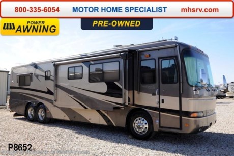 /FL  3/19/14  *SOLD*   Used Monaco RV for Sale- 2002 Monaco Dynasty Baroness with 3 slides and 69,497 miles. This RV is approximately 39 feet in length with a Cummins 370HP engine with side radiator, Roadmaster raised rail chassis with tag axle, power mirrors with heat, 7.5KW Onan generator with 171 hours on a power slide, power patio awning, door and window awnings, gas/electric water heater, 50 Amp power cord reel, pass-thru storage, 2 full length slide-out cargo trays, aluminum wheels, keyless entry, Sani-Con drainage system, 10K lb. hitch, leveling system, back up camera, inverter, ceramic tile floors, solid surface counter, dual pane windows, convection microwave, washer/dryer combo, computer desk, dual sleep number bed, 2 ducted roof A/Cs with heat pumps and 2 TVs. For additional information and photos please visit Motor Home Specialist at www.MHSRV .com or call 800-335-6054.