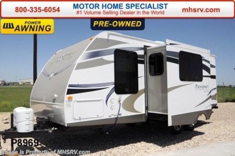/NV 5/30/2014 &lt;a href=&quot;http://www.mhsrv.com/travel-trailers/&quot;&gt;&lt;img src=&quot;http://www.mhsrv.com/images/sold-traveltrailer.jpg&quot; width=&quot;383&quot; height=&quot;141&quot; border=&quot;0&quot;/&gt;&lt;/a&gt; Used Keystone Travel Trailer for Sale- 2014 Keystone Passport Ultra Lite Elite 23RB is approximately 22 feet in length with a slide, power patio awnings, gas/electric water heater, pass-thru storage, aluminum wheels, exterior grill, black tank rinsing system, exterior shower, ducted roof A/C, leather sofa with sleeper, blinds, microwave, 3 burner range with oven, sink covers, solid surface counter, refrigerator, all in 1 bath, glass door shower, ducted roof A/C and a LCD TV. For additional information and photos please visit Motor Home Specialist at www.MHSRV .com or call 800-335-6054.