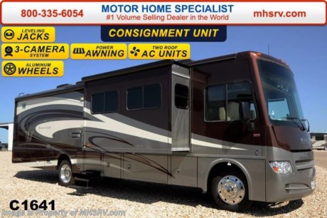 /SOLD 3/30/2015 **Consignment** Used Winnebago RV for Sale- 2014 Winnebago Sightseer 35G with 3 slides and 3,456 miles. This RV is approximately 36 feet in length with a Ford Triton V10 engine, Ford chassis, power mirrors with heat, power privacy shades, 5.5KW Onan generator, power patio awning, slide-out room toppers, gas/electric water heater, side swing baggage doors, aluminum wheels, exterior shower, 5K lb. hitch, automatic hydraulic leveling system, 3 camera monitoring system, Xantrax inverter, convection microwave, dual pane windows, fireplace, solid surface counter, 2 ducted roof A/Cs and 2 LCD TVs. For additional information and photos please visit Motor Home Specialist at www.MHSRV .com or call 800-335-6054.