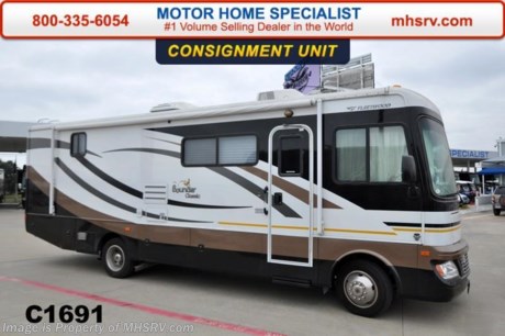 /SOLD 3/30/2015 **Consignment** Used Fleetwood RV for Sale- 2010 Fleetwood Bounder 30T with 2 slides and 16,080 miles. This RV is approximately 30 feet in length with a Ford V10 engine, Ford chassis, power mirrors with heat, 5.5KW Onan generator with 62 hours, patio awning, slide-out room toppers, side swing baggage doors, 5K lb. hitch, automatic hydraulic leveling system, back up camera, dual pane windows, 3 burner range with oven, memory foam mattress, 2 ducted roof A/Cs and 2 LCD TVs. For additional information and photos please visit Motor Home Specialist at www.MHSRV .com or call 800-335-6054.