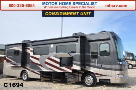 /PICKED UP 4/30/15
**Consignment** Used 2013 Thor Motor Coach Tuscany w/4 Slides Model 36MQ - This luxury diesel motor home measures approximately 37 feet and 6 inches in length and is highlighted by the expandable L-shaped sofa, 40 inch LCD TV, fireplace, king bed, residential refrigerator, dual roof A/C’s, 360 HP Cummins Engine w/800 ft lb. torque, Freightliner XC raised rail chassis, 8 KW Onan diesel generator and a 2000 Watt inverter w/100 Amp charge. Features include a stack washer/dryer, exterior entertainment center, 32&quot; LCD TV in overhead, Vintage Maple wood and Sedona full body paint.  For additional information and photos please visit Motor Home Specialist at www.MHSRV .com or call 800-335-6054.