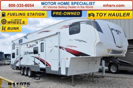 /SOLD 3/30/15 Used Keystone RV for Sale- 2008 Keystone Fuzion 362 is approximately 38 feet in length with 2 slides, toy hauler area, bunk beds, 5.5KW Onan generator with 24 hours, patio awning, pass-thru storage, water heater, aluminum wheels, LED running lights, black tank rinsing system, exterior shower, exterior speakers, surround sound system, 2 sofas, day/night shades, ceiling fan, microwave, 3 burner range with oven, sink covers, refrigerator, ducted roof A/C and a LCD TV. For additional information and photos please visit Motor Home Specialist at www.MHSRV .com or call 800-335-6054.