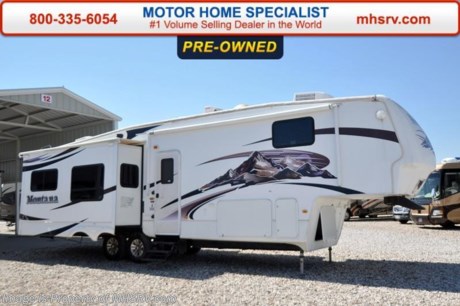 Used Keystone Fifth Wheel RV for Sale- 2009 Keystone Montana 3665RE is approximately 37 feet 6 inches in length with 4 slides, power patio awning, slide-out room toppers, gas/electric water heater, 50 amp service, pass-thru storage with side swing baggage doors, aluminum wheels, black tank rinsing system, exterior shower, roof ladder, sofa with sleeper, dinette, workstation, day/night shades, Fantastic Vent, ceiling fan, kitchen island, microwave, 3 burner range with oven, solid surface counter, sink covers, refrigerator, all in 1 bath, glass door shower with seat, memory foam mattress, safe, 2 ducted roof A/Cs and a LCD TV with surround sound. For additional information and photos please visit Motor Home Specialist at www.MHSRV .com or call 800-335-6054.