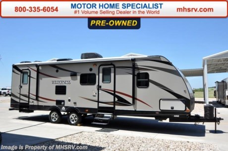 /TX 9-1-15 &lt;a href=&quot;http://www.mhsrv.com/travel-trailers/&quot;&gt;&lt;img src=&quot;http://www.mhsrv.com/images/sold-traveltrailer.jpg&quot; width=&quot;383&quot; height=&quot;141&quot; border=&quot;0&quot;/&gt;&lt;/a&gt;
Used 2015 Heartland Wilderness travel trailer model 2850BH features a slide, a double queen bunk, ducted A/C, 82&quot; interior ceilings, double door refrigerator, tinted windows, stabilizer jacks, power vent, gas/electric water heater, steel ball bearing guides, enclosed under-belly, indoor &amp; outdoor speakers, dual LP tanks with auto change over, cable hookup, 55 amp 12 volt power converter &amp; the wide trax axle system, tan fiberglass, premium graphic package, upgraded black trim, black skirt metal and black diamond plate, aluminum wheels, large flat screen TV, power stabilizer jacks, upgraded 15.0 BTU A/C, spare tire &amp; carrier as well as a power awning. For additional information and photos please visit Motor Home Specialist at www.MHSRV .com or call 800-335-6054.