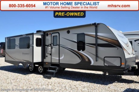 /TX 1/18/16 &lt;a href=&quot;http://www.mhsrv.com/travel-trailers/&quot;&gt;&lt;img src=&quot;http://www.mhsrv.com/images/sold-traveltrailer.jpg&quot; width=&quot;383&quot; height=&quot;141&quot; border=&quot;0&quot;/&gt;&lt;/a&gt;
Used Passport Travel Trailer RV for Sale- 2015 Passport Ultra Light 31RE is approximately 31 feet 7 inches with 2 slides, power patio awning, gas/electric water heater, pass-thru storage, aluminum wheels, black tank rinsing system, exterior shower, exterior shower, blinds, kitchen island, leather sofa with sleeper, microwave, 3 burner range with oven, solid surface counter, sink covers, all in 1 bath, glass door shower, ducted A/C, LED TV and much more. For additional information and photos please visit Motor Home Specialist at www.MHSRV .com or call 800-335-6054.