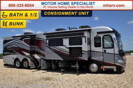 /OK SOLD 6/28/16 **Consignment** Used American Coach for Sale- 2013 American Revolution 42T bath &amp; &#189; bunk house with 3 slides and 21,433 miles. This RV features a Cummins 450HP engine, Freightliner raised rail chassis with tag axle, power mirrors with heat, power pedals, GPS, power privacy shades, 10KW Onan generator with AGS, power patio and door awnings, window awnings, Aqua Hot, 50 amp power cord reel, pass-thru storage with side swing baggage doors, 4 half length slide-out cargo trays, aluminum wheels, power water hose reel, Sani-Con drainage system, 15K lb. hitch, automatic leveling system, 3 camera monitoring system, inverter, ceramic tile floor, all electric, dual pane windows, convection microwave, dishwasher, solid surface counter, residential refrigerator, solid surface counter, washer/dryer stack, glass door shower with seat, king size memory foam mattress, 3 ducted A/Cs and much more. For additional information and photos please visit Motor Home Specialist at www.MHSRV.com or call 800-335-6054.