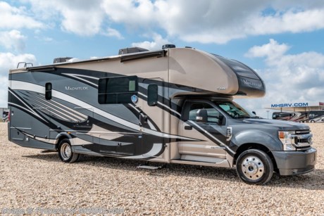 MSRP $226,381. New 2021 Thor Motor Coach Magnitude SV34 Super C is approximately 35 feet 6 inches in length with a full wall slide and is powered by the Ford&#174; 6.7L Power Stroke&#174; V8 turbo diesel engine with 330HP, 825 lb.-ft. torque and 10 speed transmission with selectable drive modes including Tow/Haul, Eco, Deep Sand/Snow. Also includes a SYNC 3 Enhanced Voice Recognition Communications and Entertainment System, 8&quot; Color LCD touchscreen with swiping capability, 911 assist, AppLink and smart-charging USB ports and navigation. New features for 2021 include general d&#233;cor updates throughout the coach, HDMI switcher on all TVs, solar charging system with power controller, lights now deploy in the arms of the Care Free awning, new grill, automatic head lights and the FordPass Connect 4G Wi-Fi modem.  This beautiful RV also features the optional leatherette theater seats and the single child safety tether. The Magnitude Super C also features a 3 camera monitoring system, aluminum wheels, automatic leveling jacks, power patio awning with LED lighting, frameless windows, keyless entry, residential refrigerator, large OTR convection microwave, solid surface kitchen counter top, ball bearing drawer guides, king size bed, large TV in living area, exterior entertainment center with sound bar, 6KW Onan diesel generator with automatic generator start, multiplex wiring control system, tankless water heater, 1800-watt inverter and much more. For additional details on this unit and our entire inventory including brochures, window sticker, videos, photos, reviews &amp; testimonials as well as additional information about Motor Home Specialist and our manufacturers please visit us at MHSRV.com or call 800-335-6054. At Motor Home Specialist, we DO NOT charge any prep or orientation fees like you will find at other dealerships. All sale prices include a 200-point inspection, interior &amp; exterior wash, detail service and a fully automated high-pressure rain booth test and coach wash that is a standout service unlike that of any other in the industry. You will also receive a thorough coach orientation with an MHSRV technician, a night stay in our delivery park featuring landscaped and covered pads with full hook-ups and much more! Read Thousands upon Thousands of 5-Star Reviews at MHSRV.com and See What They Had to Say About Their Experience at Motor Home Specialist. WHY PAY MORE? WHY SETTLE FOR LESS?
