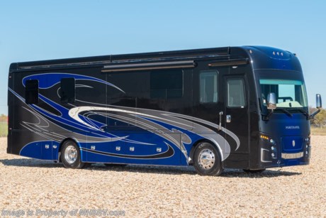 M.S.R.P. $786,010. 2021 Foretravel Realm FS450 Luxury Suite Side Bath (LSSB) - The  Foretravel Realm is the preeminent luxury motor coach on the market today and it is now available in a compact 37 ft. 8 inch floor plan making the all new Realm FS450 as agile as it is beautiful! The Realm FS450 is built on the K2 chassis offering Spartan’s legendary ride, handling and safety features. This motor coach is the Luxury Suite Side Bath (LSSB) floor plan with the unmistakable Excalibur interior d&#233;cor package featuring premium furnishings and the Polished Stone wood package. The interior of the coach is paired perfectly with the breathtaking Imperial-450 exterior paint scheme. The LSSB offers exceptional living &amp; dining accommodations highlighted by either an extra-long sofa with pull-out queen bed or optional theater seats across from a large power-lift LED HDTV™ and booth dinette. The LSSB also boast a massive amount of wardrobe space, and beautifully tiled backsplashes, floors, bath and shower. You will also find the Valid Graphical Instrumentation Cluster (GIC) that provides a custom tailored and multi-functional digital dash display second to none. Foretravel’s Premier Steer Column Drive™ driver’s assist system further adds to the exceptional ride and comfort of the Realm FS450 along with its in-dash navigation system, Silverleaf Total Coach™ house monitoring system, premium dash audio complete with amplifier and subwoofer, a dedicated monitor for the Total Vision&#174; power rear camera, sideview cameras and additional &quot;Bird&#39;s Eye View&quot; camera system providing the ultimate in coach visibility, a three-stage engine brake, push button ignition, Michelin&#174; tires, a driver’s alert system with lane departure warnings, Intelligent High Beam Control (IHC), speed limit indicator, VIP SMART Wheel, Mobileye&#174; Collision Avoidance System, Integrated Tire Pressure Monitoring System (TPMS), power adjustable foot pedals, and plush captain’s chairs with power lumbar just to mention a few driver comforts. The Realm FS450 is powered by the Cummins&#174; L9 450HP diesel engine, Allison&#174; 3000 Series transmission and an industry leading independent front suspension (IFS) for best-in-class ride and handling. The slides in a Realm are also undoubtedly head and shoulders above the competition. They feature pneumatic seals that provide a literal airtight seal completely around the entire slide-out room regardless of slide position for the premium in fit, finish and function. (No rubber gaskets in the floor, flap gasket seals on the exterior walls, damaging rollers, poorly sealed dropdown room mechanisms, etc.) The interior appointments of a Realm are nothing short of exceptional. You will find beautiful solid surface counters, tiles and tapestries throughout as well as the unmistakable wood cabinetry and craftmanship that can only be found in a Foretravel. A few interior comforts include a multiplex lighting system, LED lighting throughout, (2) 15,000 BTU roof A/C, large LED HDTVs™, HD satellite, Blu-ray™, WiFi-RANGER™, Rayzar&#174; antenna, fireplace (LSSB only), shoe storage, stack washer/dryer, safe, plush pillow-top king bed in master suite, soft-close drawers, induction cooktop, high-end appliances and fixtures and electric floor heat. Additional features found in the all new Realm FS450 include steel construction sidewalls rather than the aluminum found in the competition, a 150 gallon fuel tank, Aqua-Hot&#174; 450D heating system, Onan diesel generator on slide-out tray, 3000 watt inverter, rear emergency exit door, power cord reel, outdoor entertainment with 43 inch LED HDTV&#174;, power slide-out cargo tray, power patio &amp; entry door awnings, dual pane safety glass, solar and black out night shades, One-Piece Cosmo-Lite™ Composite Roof with UV Protection (Cosmo-Lite™ is a thermoplastic substrate comprised of polypropylene resin reinforced with continuous bidirectional glass fibers. It resists scratches, rot, corrosion, and mildew and is not affected by cleaning related chemicals, or environmental exposure. Cosmo-Lite™ roofs provide significant energy absorption over traditional roof substrates and exhibits thermal expansion similar to aluminum.) LED running lights, hydraulic leveling system, and Foretravel’s Xtreme-Schemes full body paint exterior with Armor-Coat sprayed protection below windshield. (Xtreme-Schemes: Far above the &quot;4-color&quot; industry norm, a Realm is a true rolling master piece of artwork. These multi-color exterior paint schemes include Intricate designs and detailing that can include custom marbling, metallics, pearls &amp; fades.) For more details contact Motor Home Specialist - Realm, by definition, is a royal kingdom; a domain within which anything may occur, prevail or dominate. The Realm of Dreams is here and available at Motor Home Specialist, the #1 Volume Selling Motor Home Dealership in the World. Visit MHSRV.com or call 800-335-6054. The Foretravel Realm FS450... Your Kingdom Awaits.